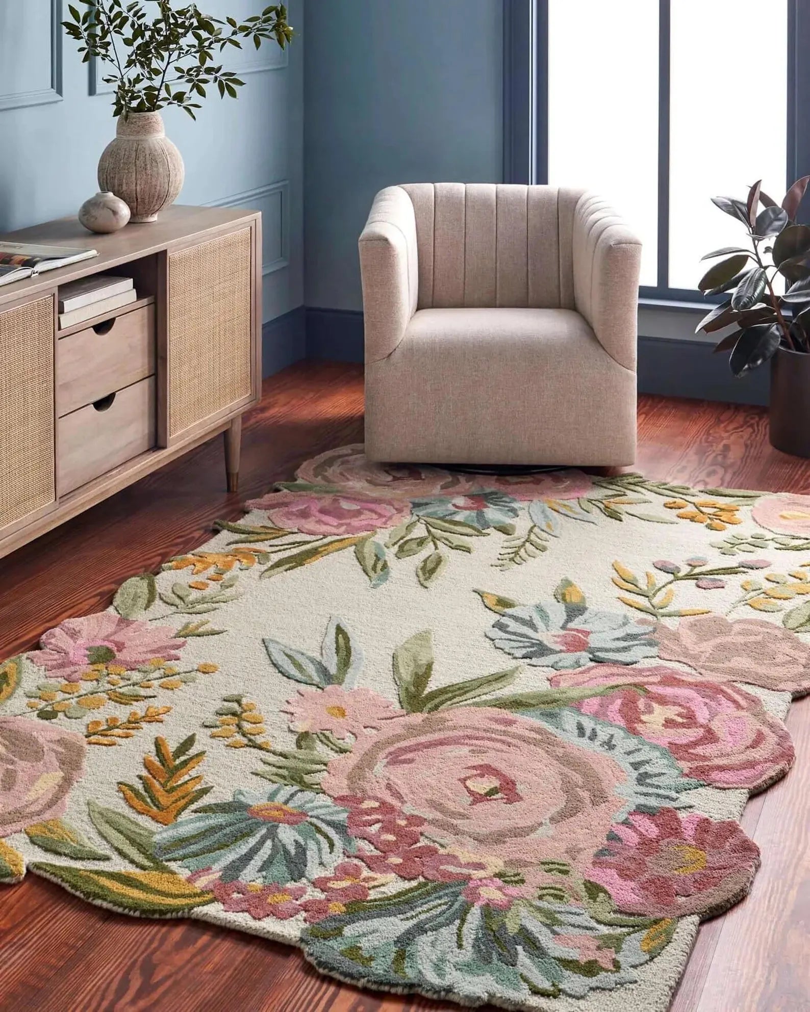 Blooming Meadow Rug styled in a bright living room with floral design.