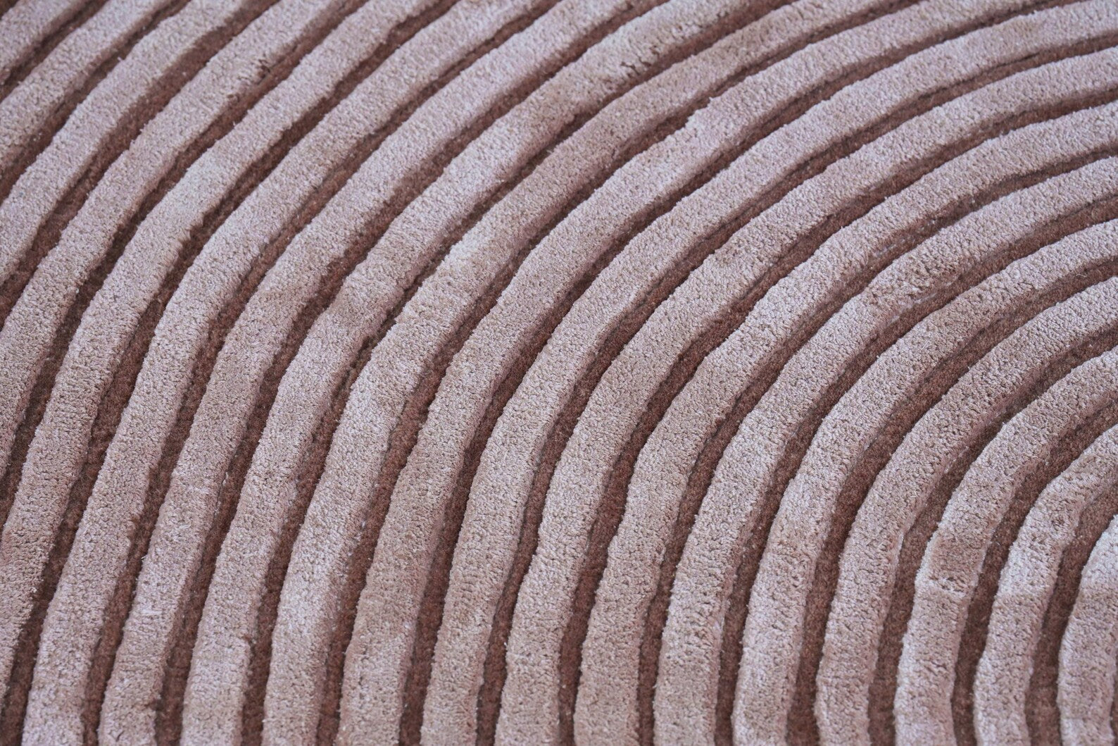 Close-up of Circular Ribbed Rug showing ribbed concentric texture.