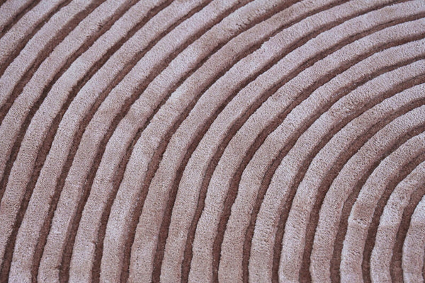 Close-up of Circular Ribbed Rug showing ribbed concentric texture.