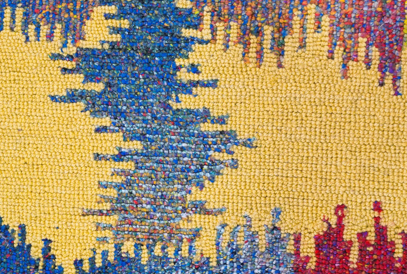 Macro texture of the Radiance Flow Rug showing pile and color transitions.