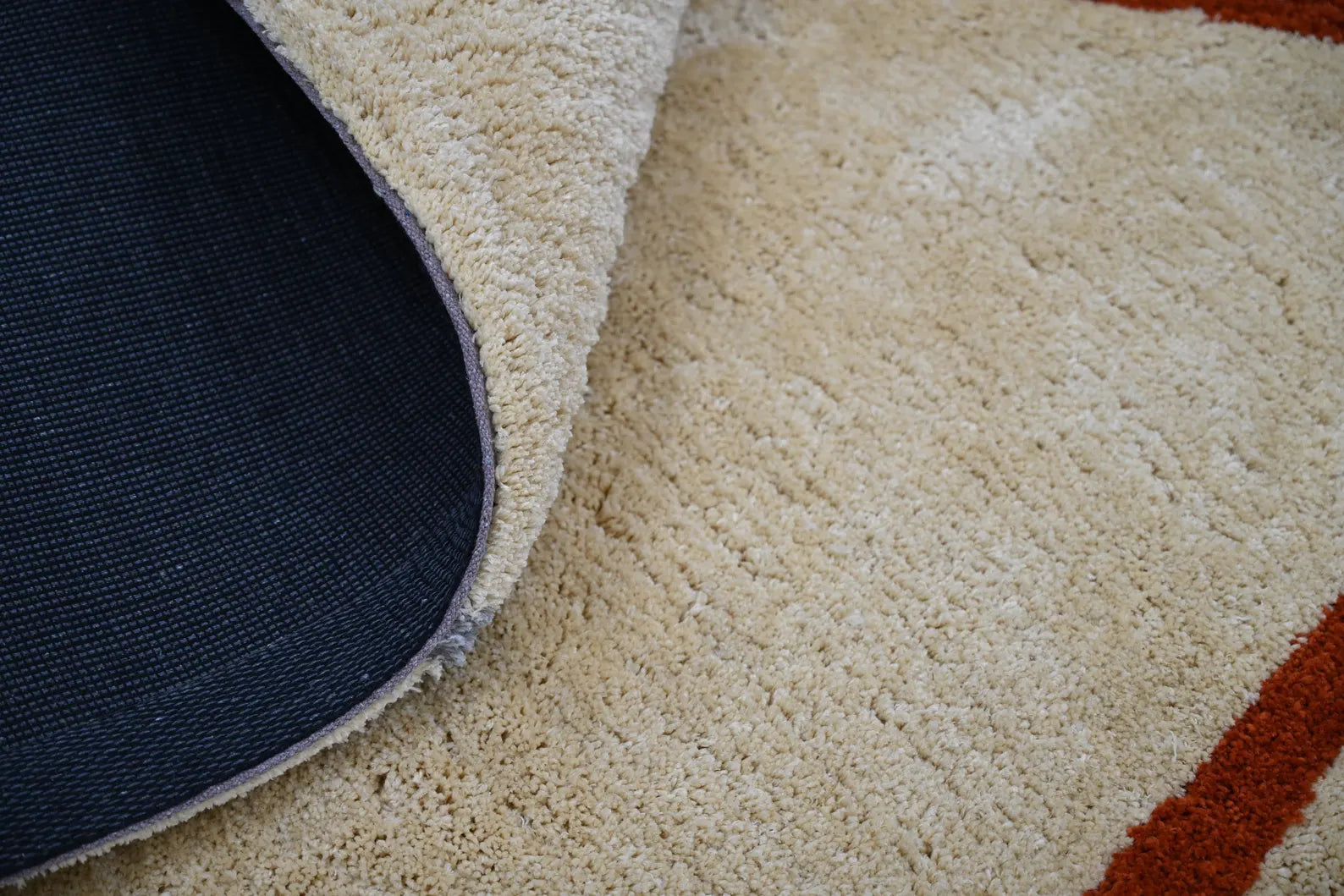 Side folded close-up view of dreamliner art rug 