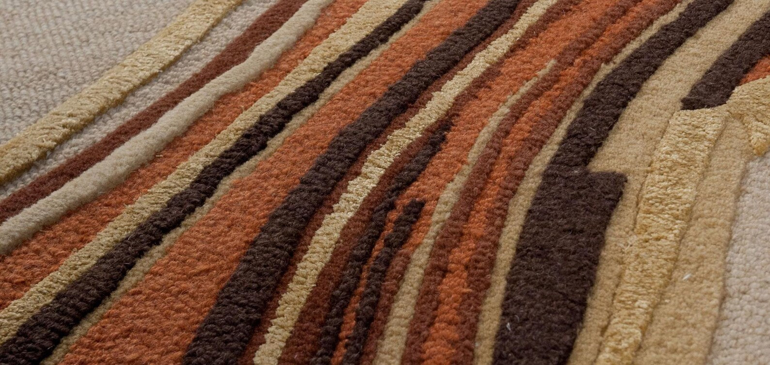 Earth-Tone Marble Swirl Carpet with organic movement and textured finish.