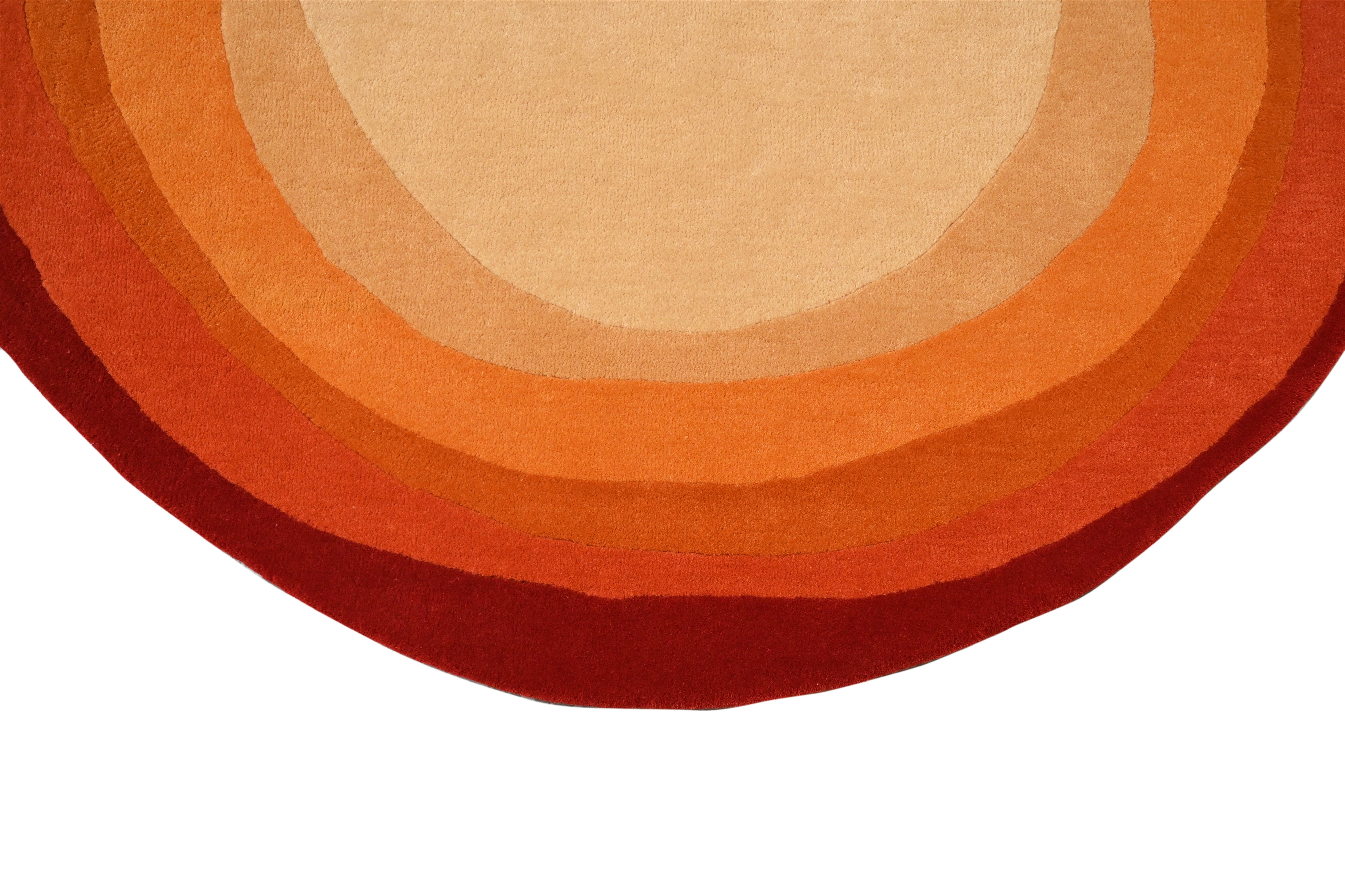 Detail shot of the vibrant gradient tones of the Eternal Colors Rug.