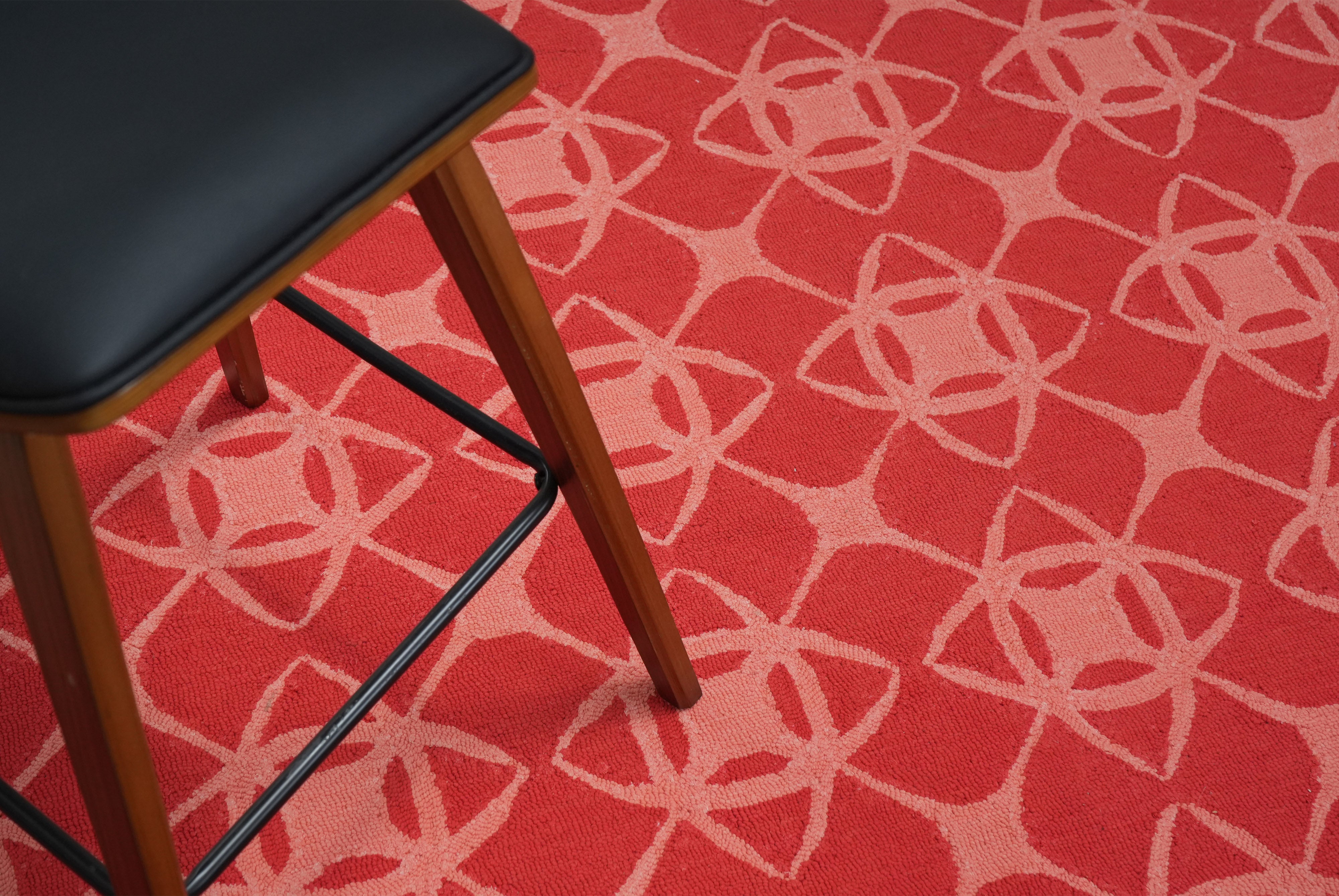 coral cipher rug close up hand tufted coral textured surface.