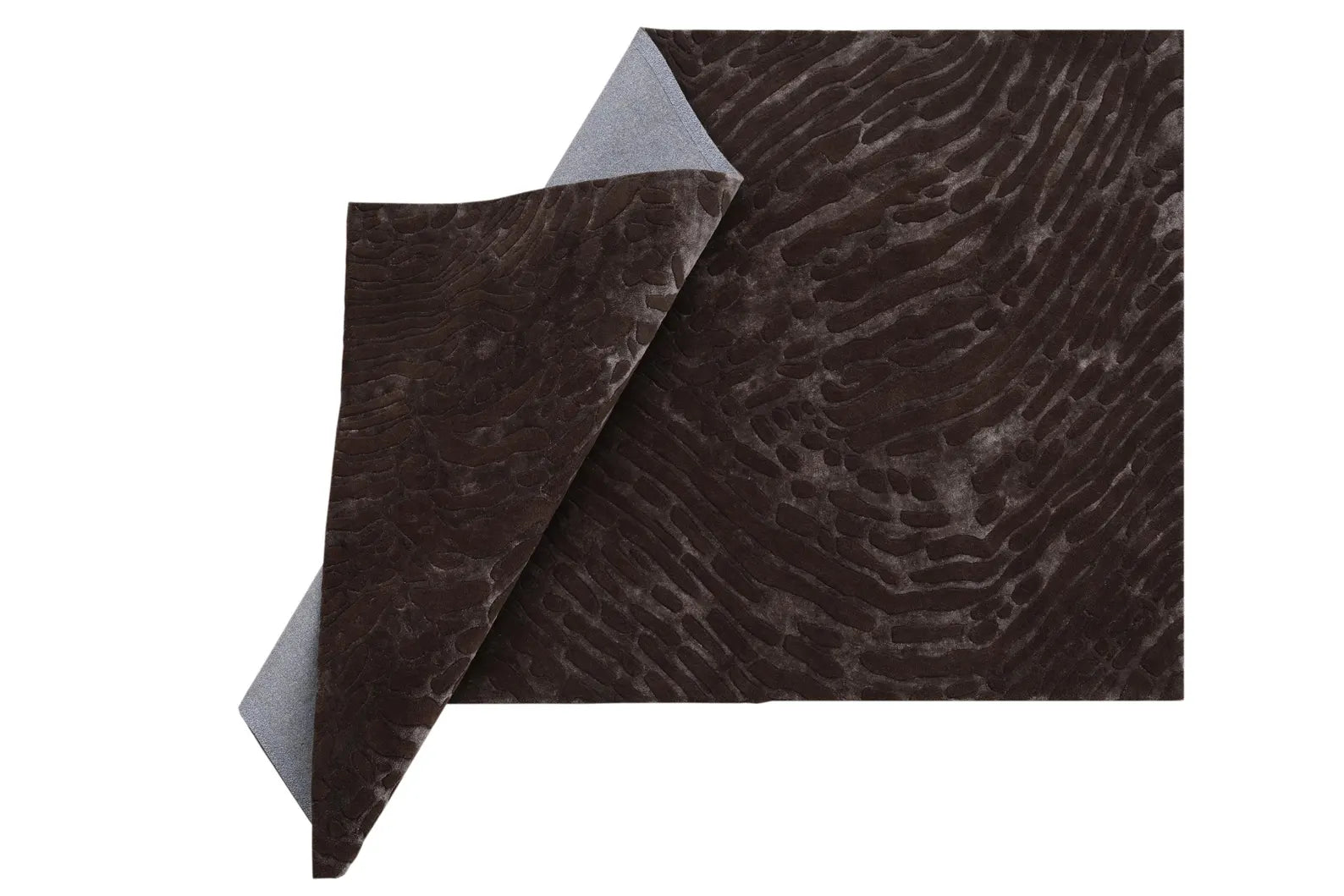 Side angle highlighting subtle high-low sculpted details.