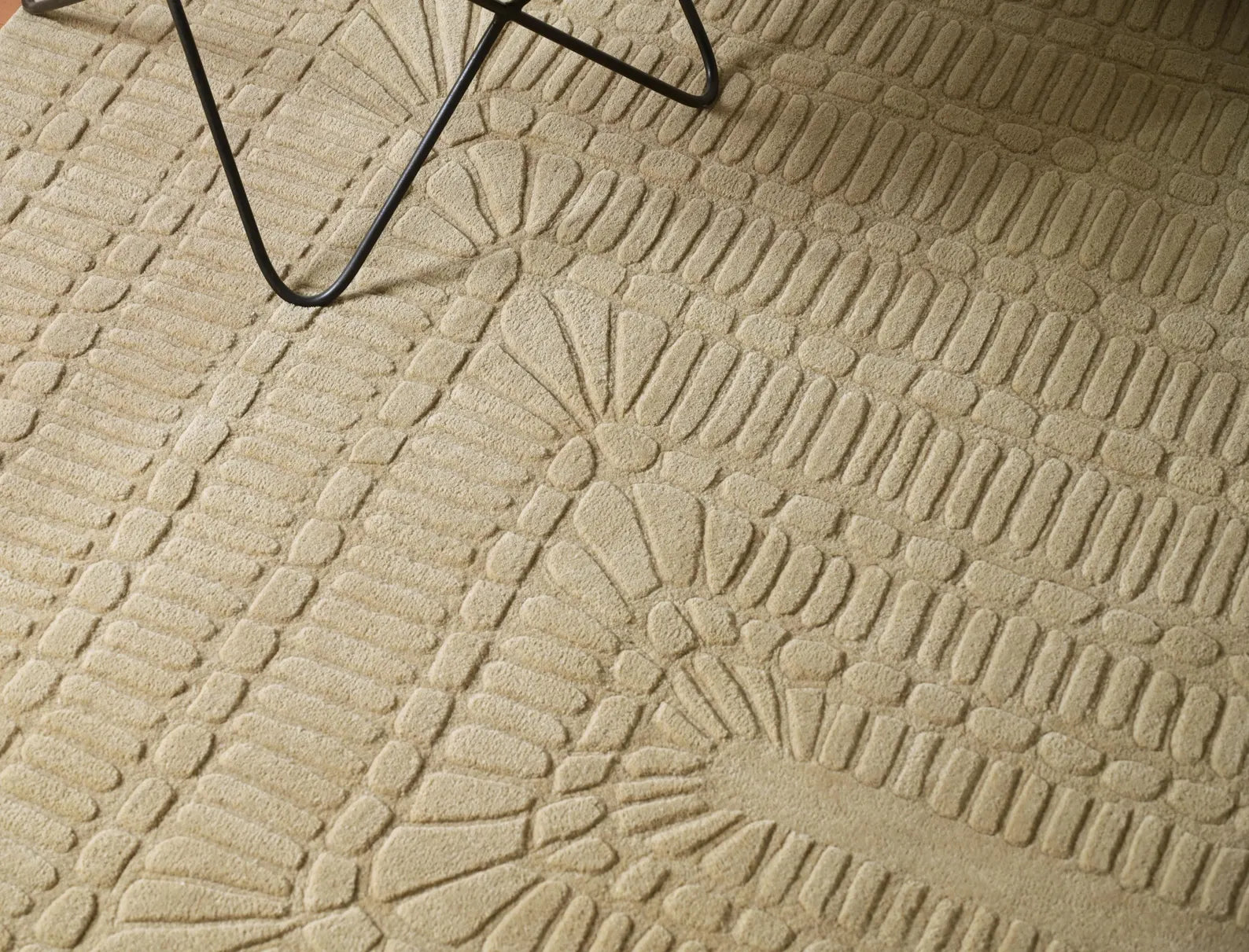 Grid Wool Rug placed in a modern room, highlighting geometric design.