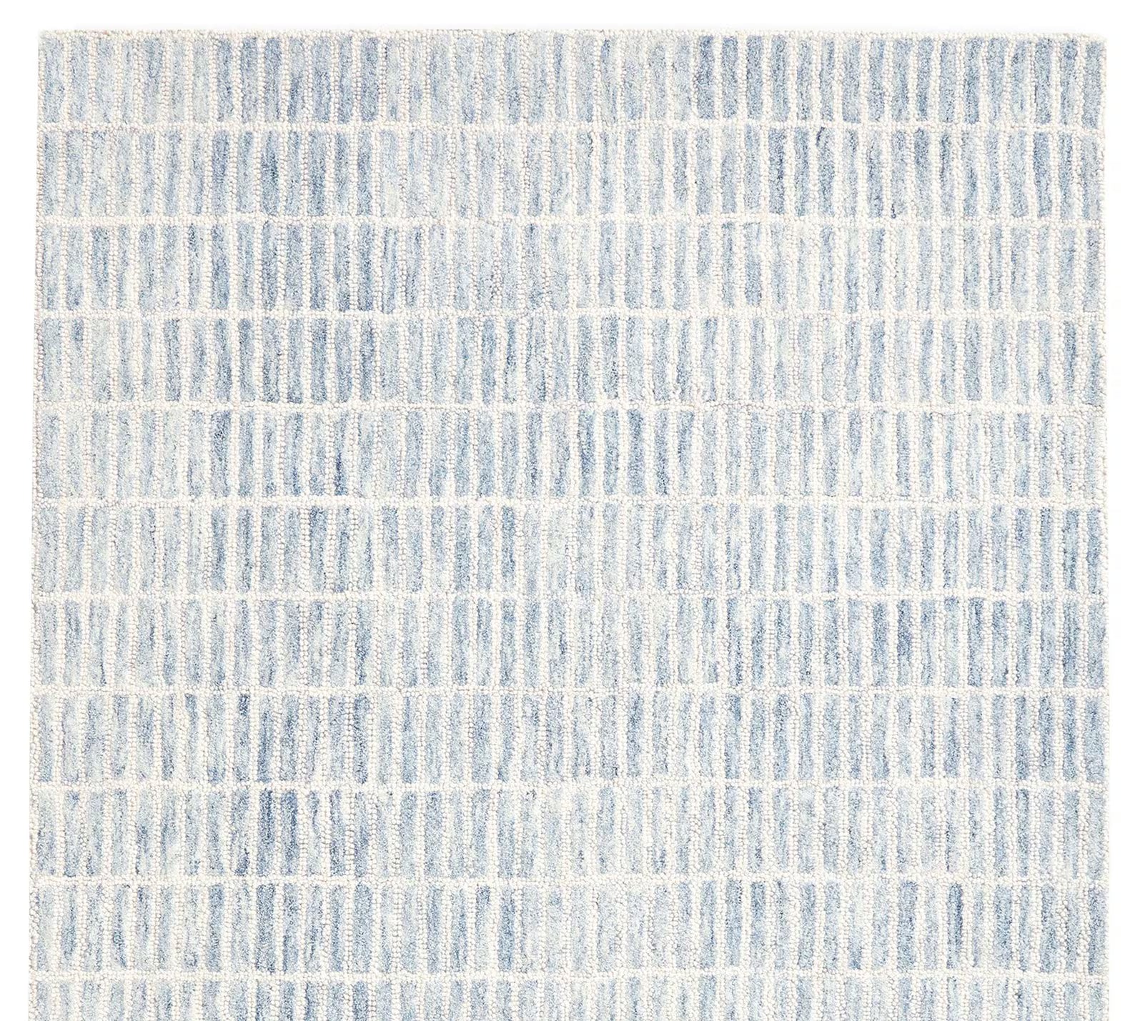 Full view of Ocean Breeze Rug in soft blue and white tones