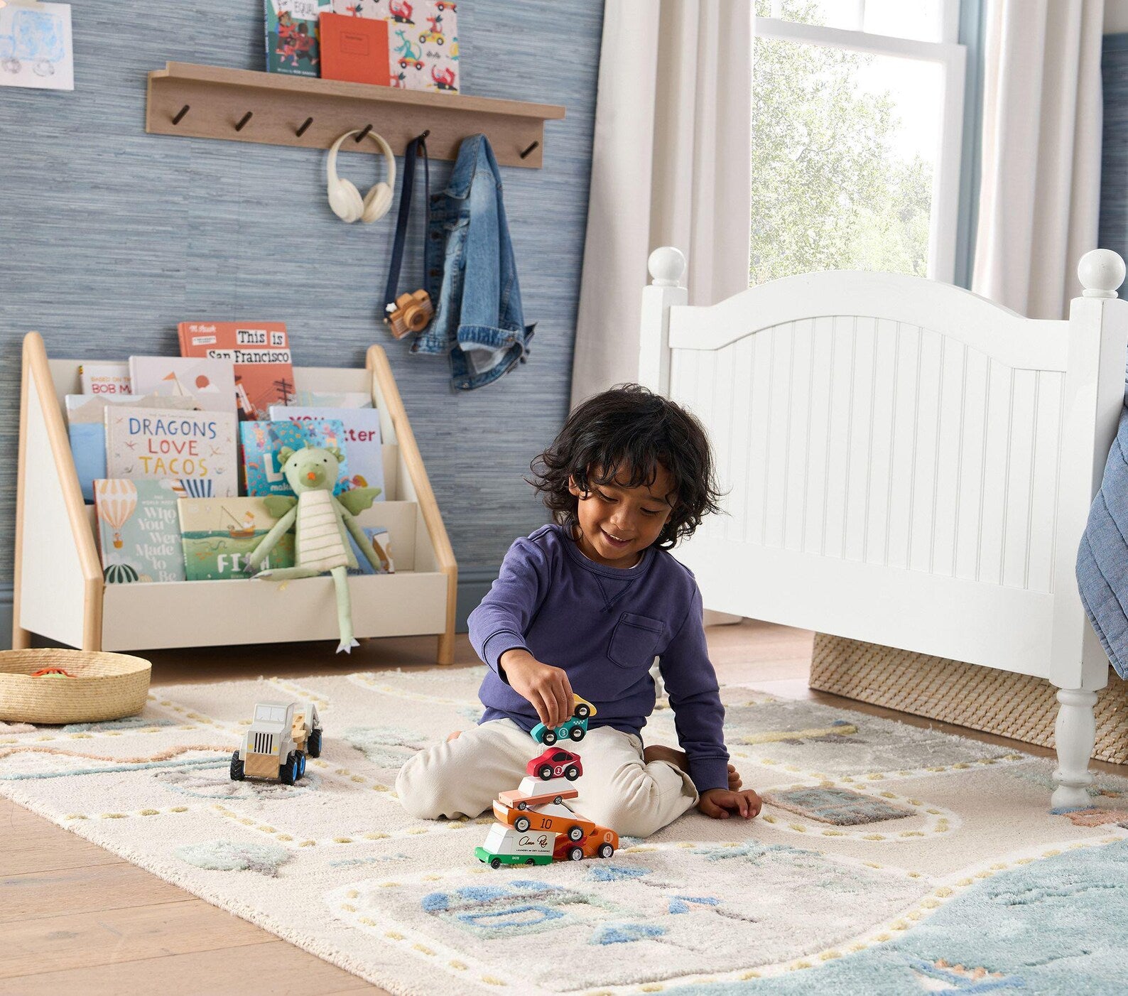 MiniCity hand_tufted_rug placed in a bright kids’ room setup with toys and furniture, creating an inviting play environment.