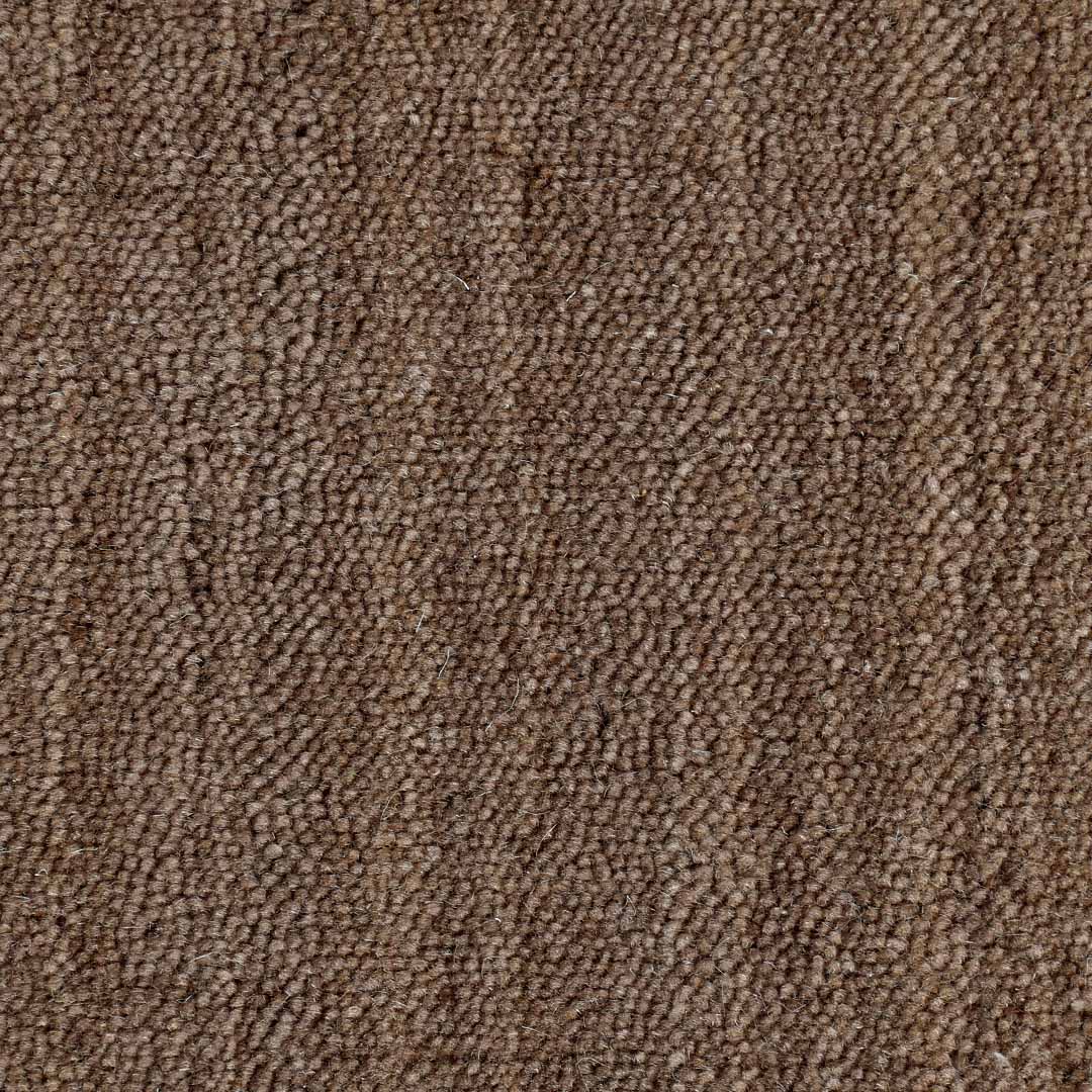 Close-up of the handloom Mocha Stripe Textured Wool Doormat showing its dense wool texture and brown tonal weave.