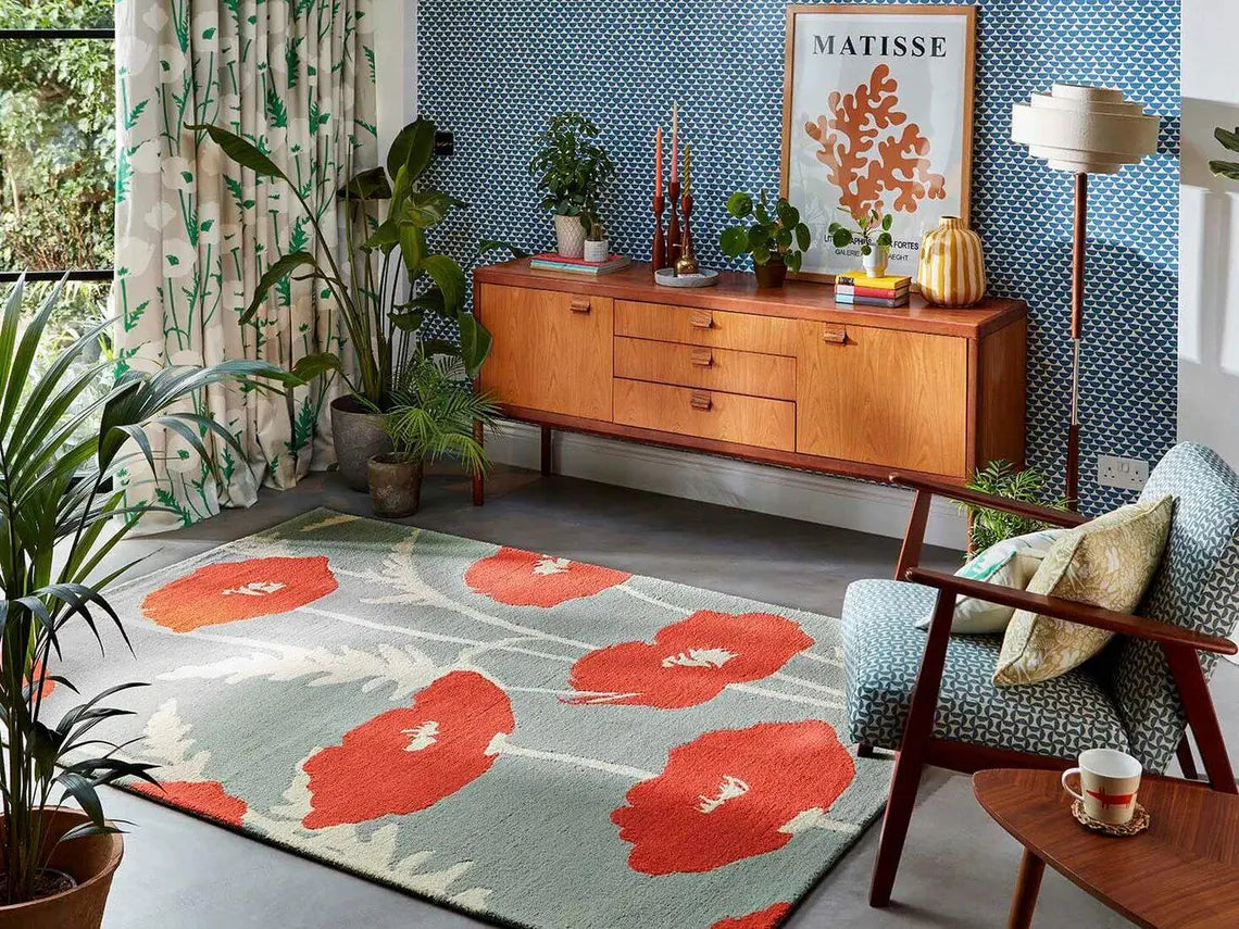 Artistic floral rug styled in a bright living room corner