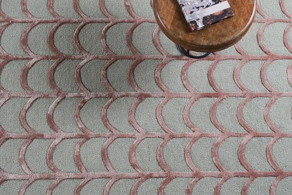 Close-up of Modern Scallop Rug showing precise scallop lines in soft hues.