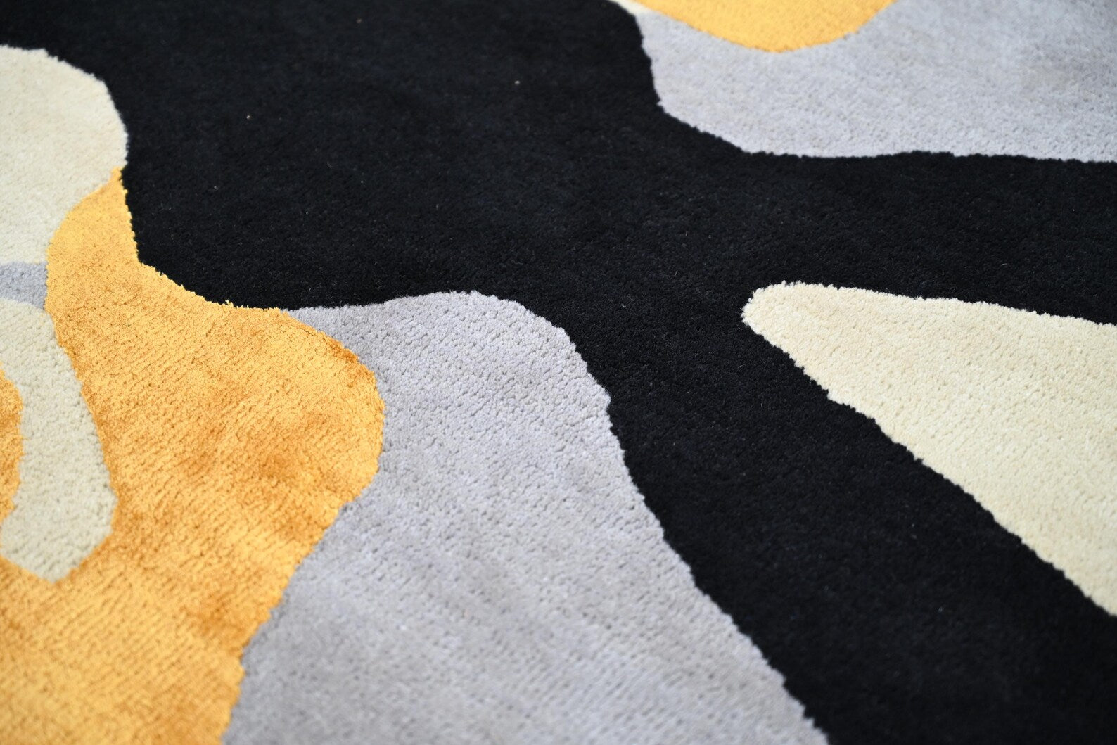 top close view of molten hand  tufted hand tufted rug  