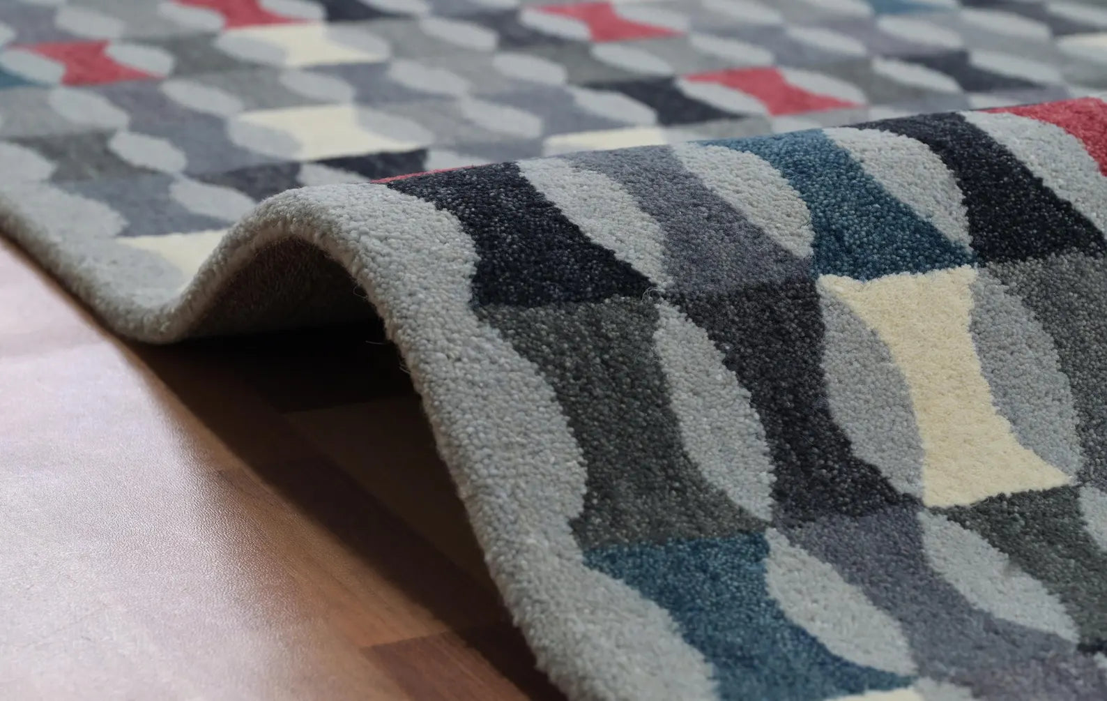 Detailed view of Monotone Matrix Rug texture with visible tuft loops and contrasting colors creating a modern mosaic effect.