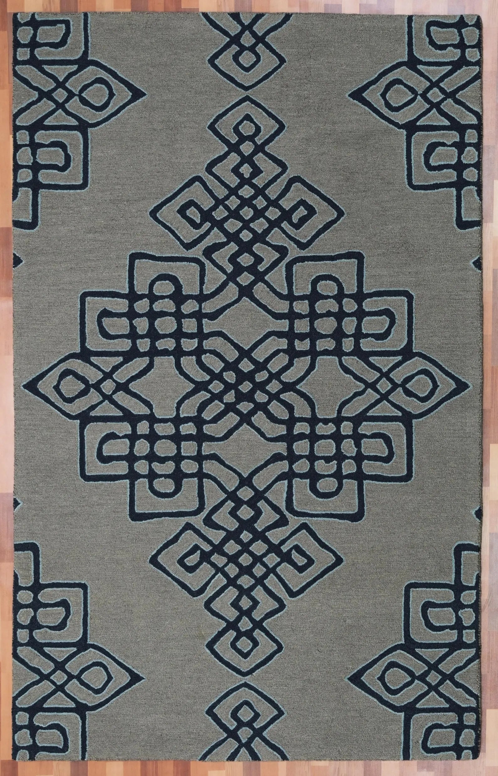 Top view of Nexform Rug highlighting symmetrical interlocking motifs in navy tone.
