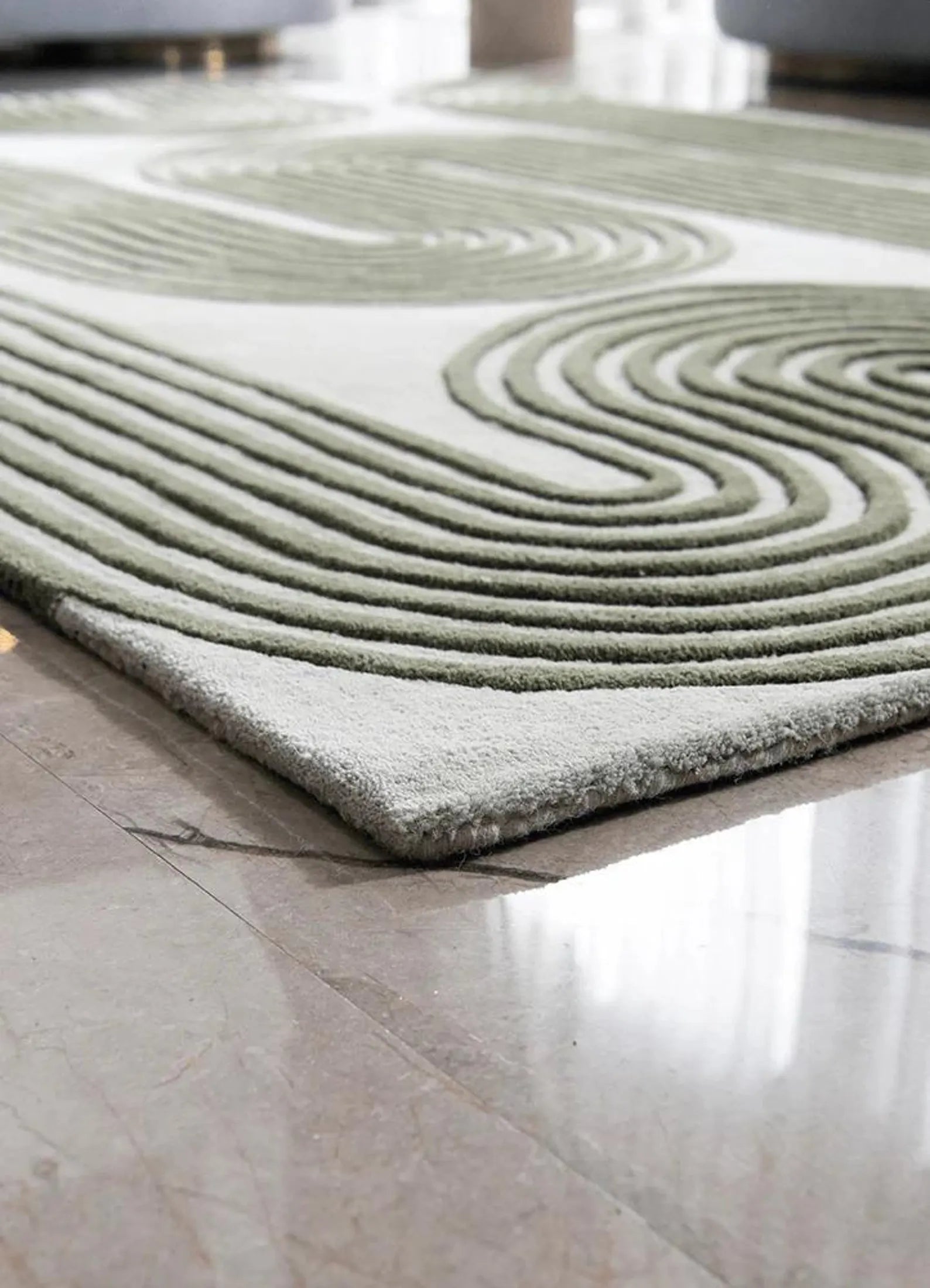 Olive Maze Rug captured from side angle highlighting pile height, clean edges, and organic geometric pattern.