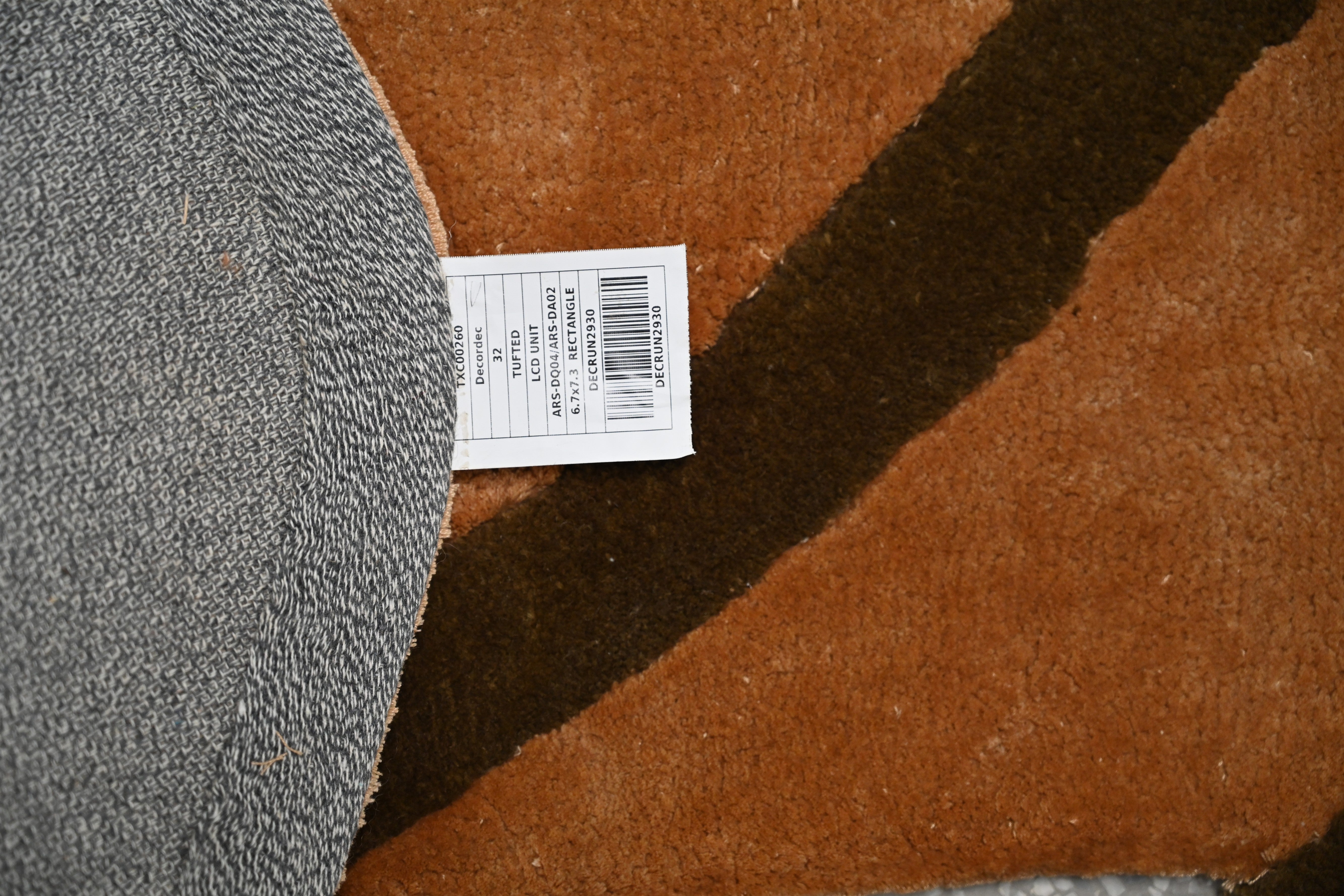 Rug backing detail highlighting quality and durability.