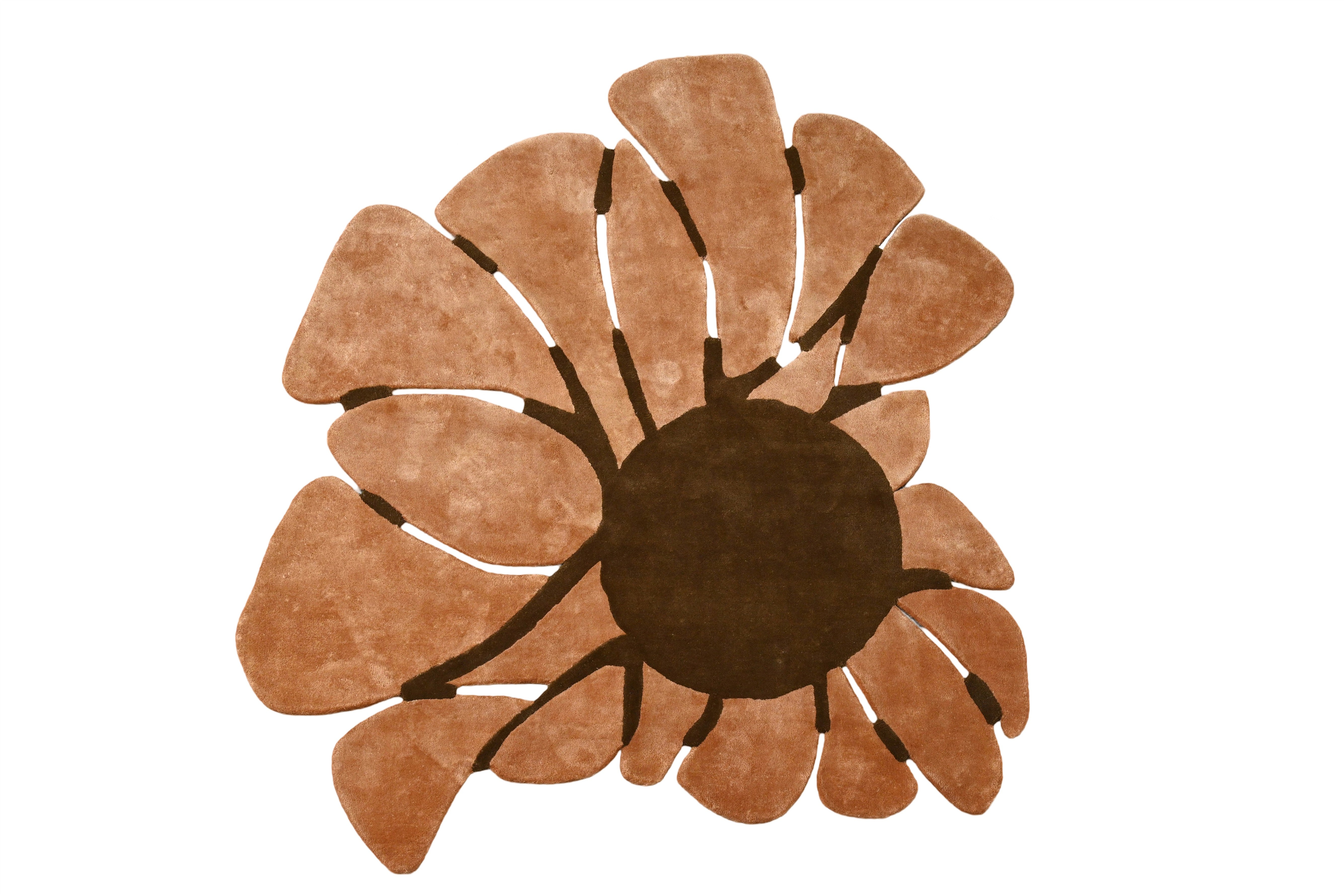 Entire rug shaped like a blooming orchid with layered design.