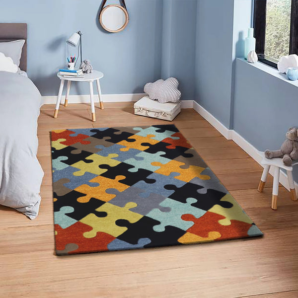 Playgrid Rug styled in a cozy modern room showcasing multicolor puzzle-grid design on a soft wool base.