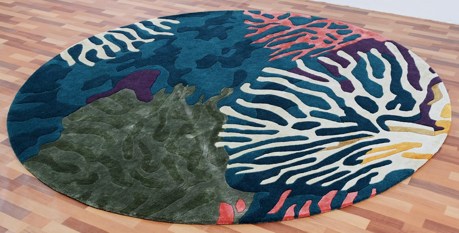 Seaform Hand tufted Rug full round view showing ocean-inspired botanical design in deep blue, green, and coral tones