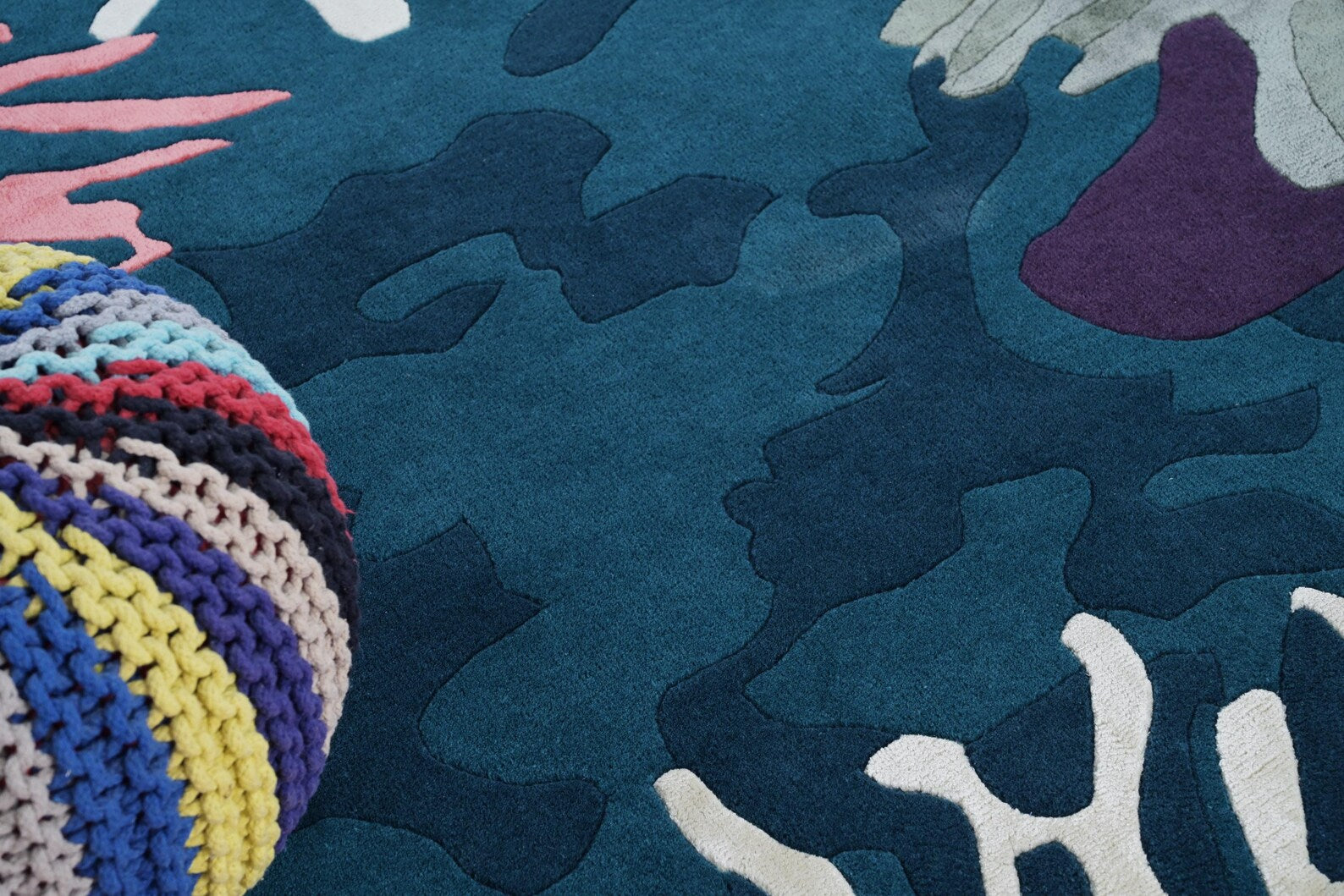 Close texture of Seaform Hand tufted Rug revealing dense tufted detailing and sculptural wave-inspired forms