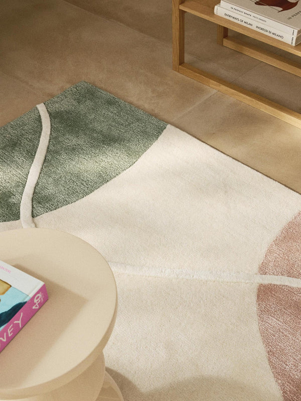 Seren Rug styled in a modern living room with elegant organic pattern and natural light