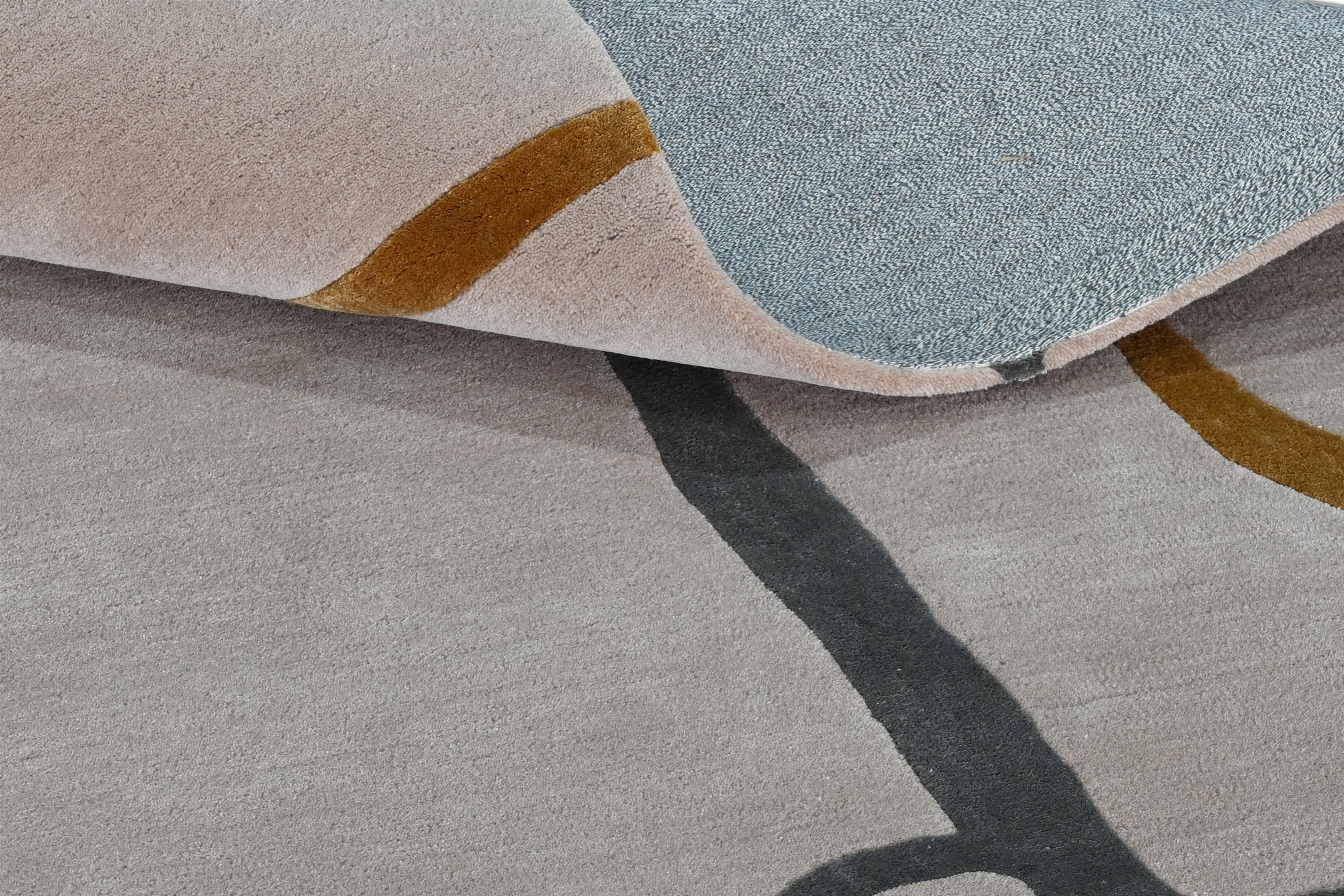 Side fold of muted motion rug back and front texture 