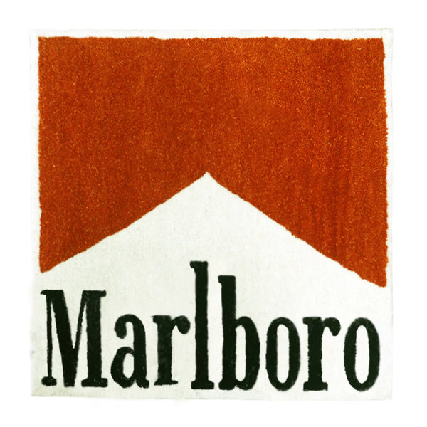 Studio full view of Marlboro Doormat photographed on white background showing red and white design with Marlboro text in bold black font