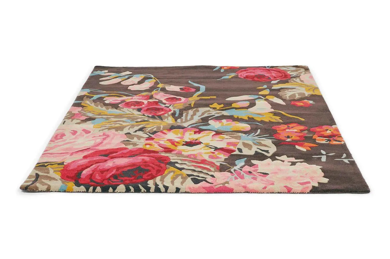Overhead flat-lay of Summer Bloom Area Rug showcasing bold floral pattern.