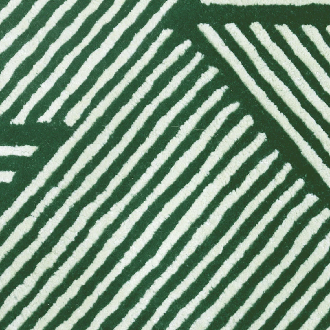 Close-up of bold green and black linear texture.
