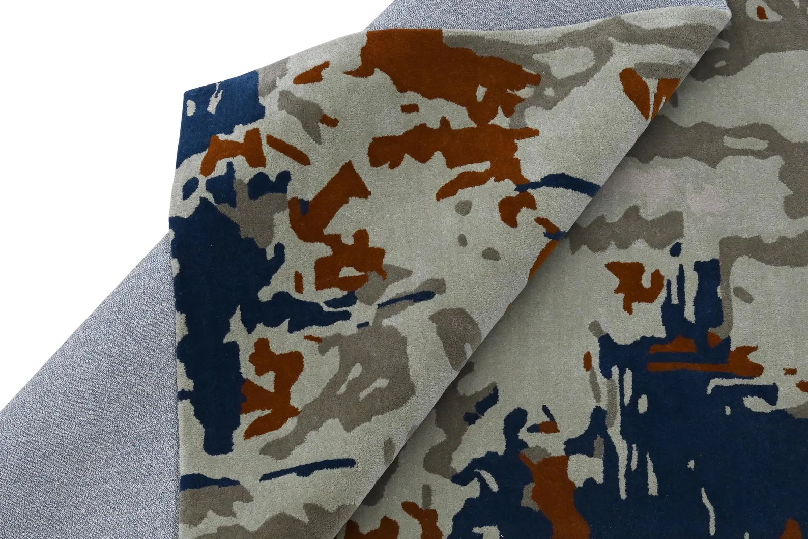 Side angle of the Urban Distressed Area Rug, showing layered textures and bold abstract strokes.