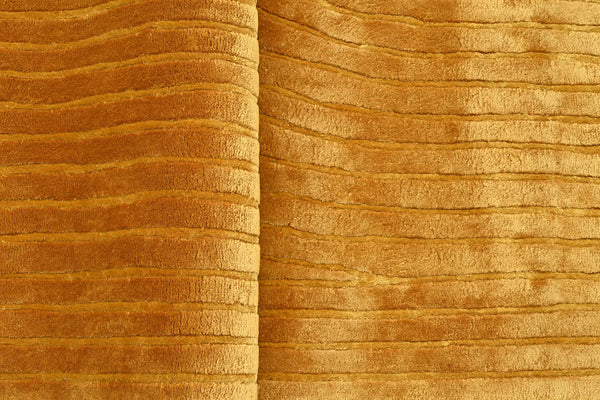 Walkin Wardrobe Rug in golden yellow with ribbed velvet-like texture.