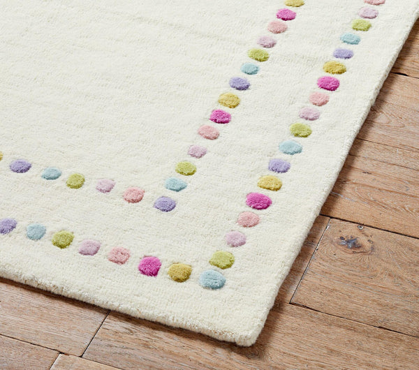 Candy Dots Rug corner view showing raised pastel dots and clean hand finished edge