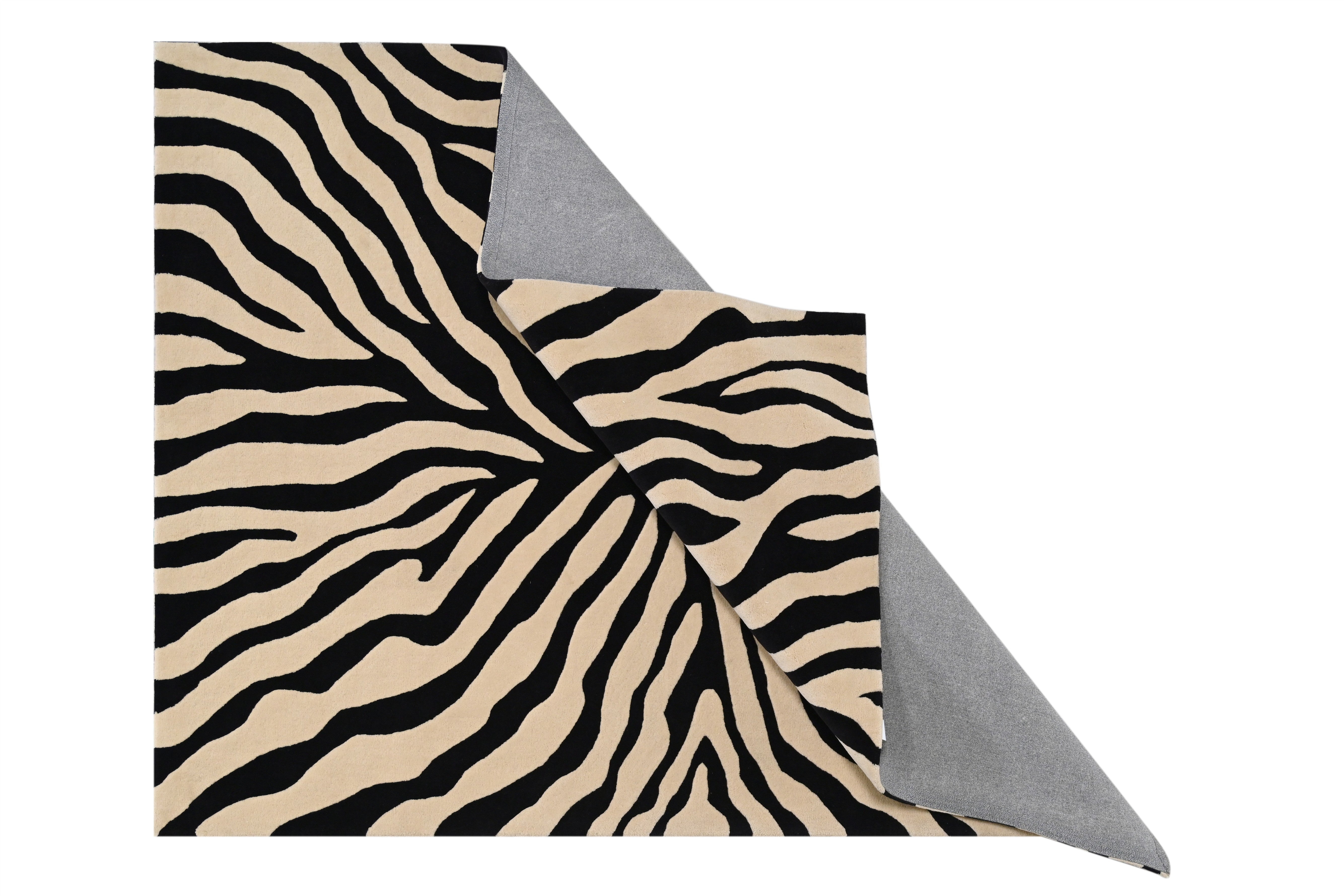 Backside of Zebra Bloom Rug showing sturdy hand tufted finishing.