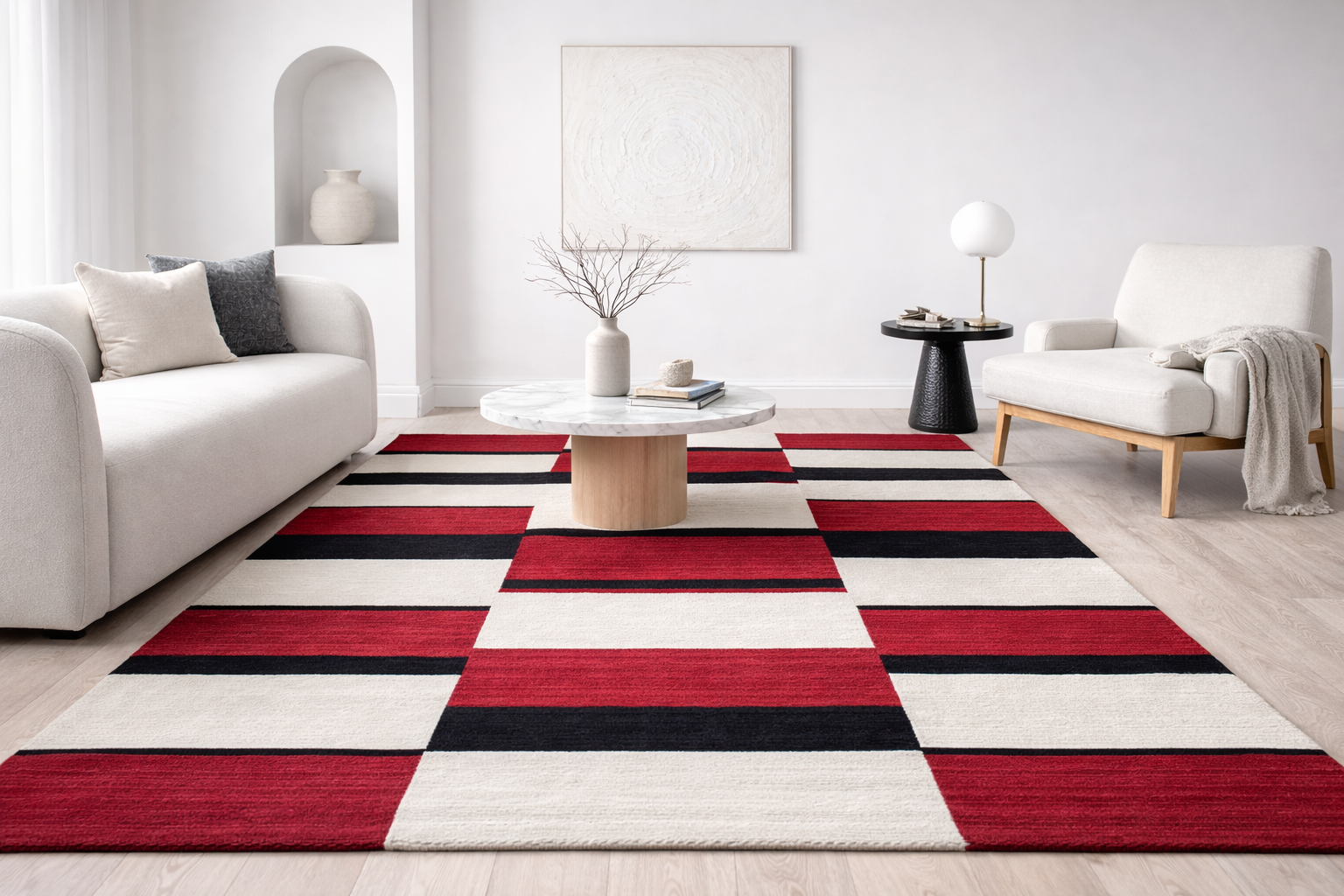 Corvane hand tufted rug in red, ivory, and black geometric design placed centrally between two sofas in a modern minimalist living room.