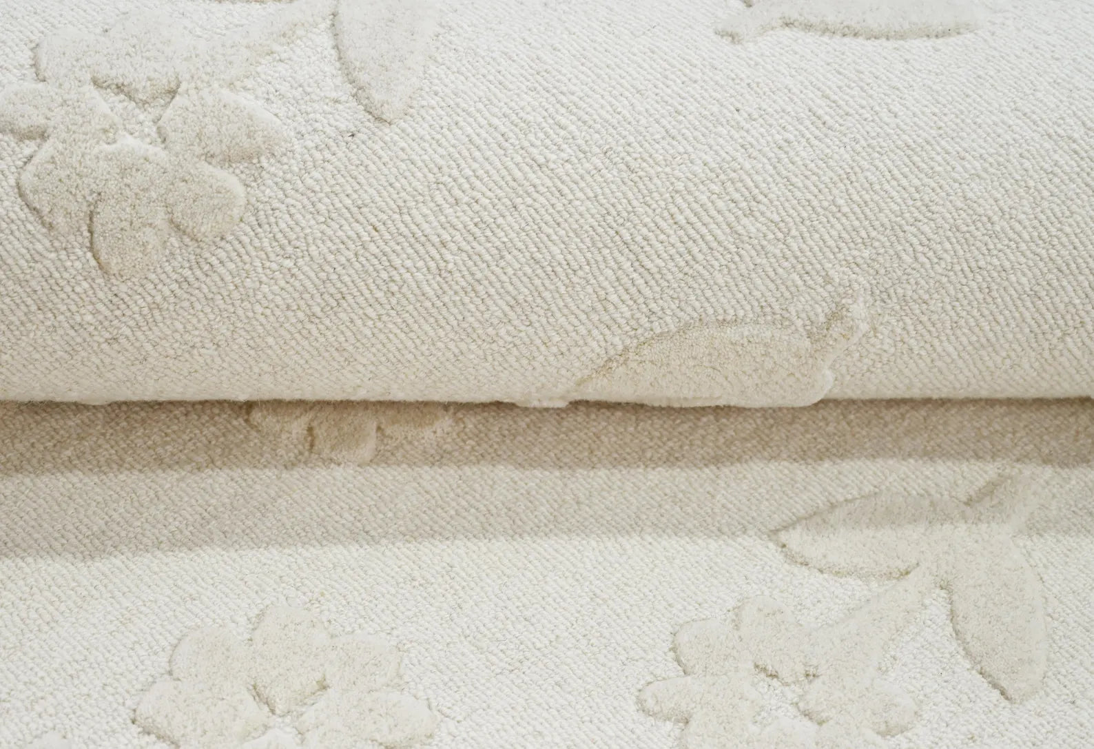 Flourish Rug folded corner showing dense pile structure and clean hand finished edge