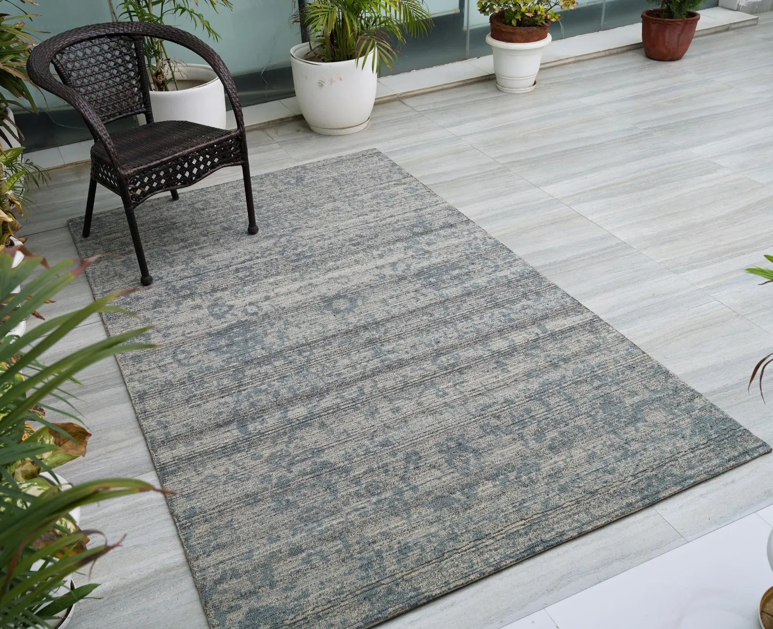 Hand tufted Azure Fade Rug long view showing soft gradient fade and traditional blue motifs