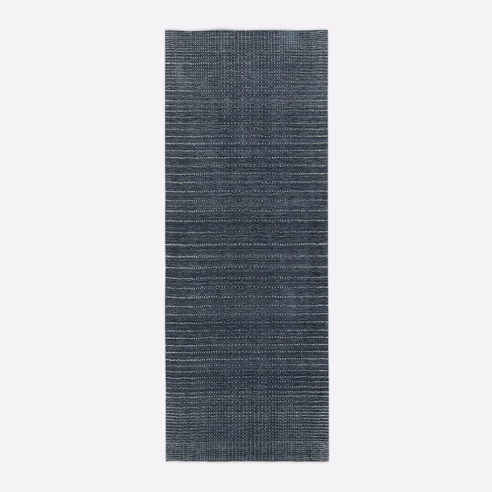 Long rectangular hand tufted Indigo Dot Texture Runner Rug displayed on a clean white background, highlighting its minimalist dotted weave pattern and fine woven detailing.
