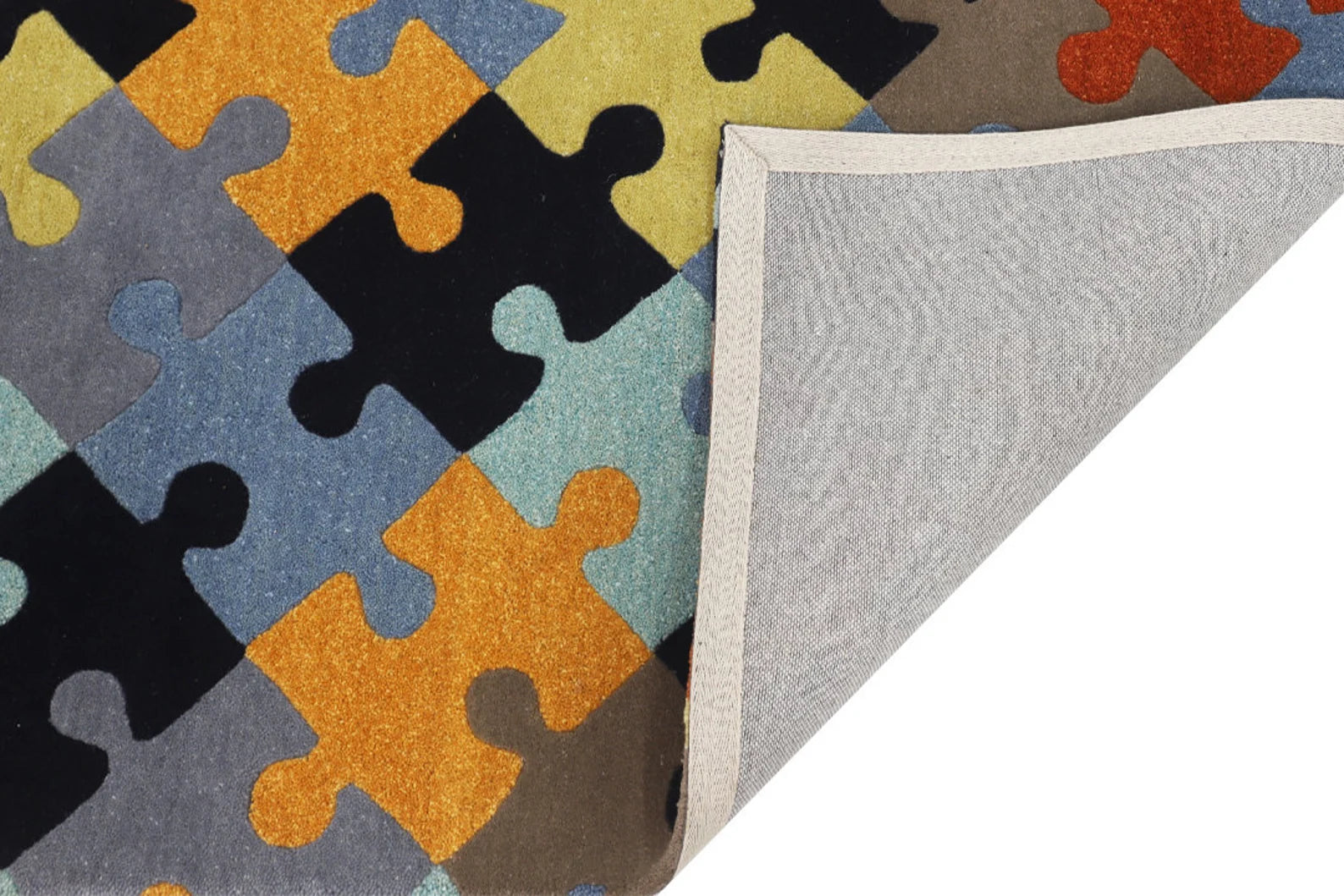 Back view of the hand tufted Playgrid Rug showing sturdy cotton backing and clean finished edges.