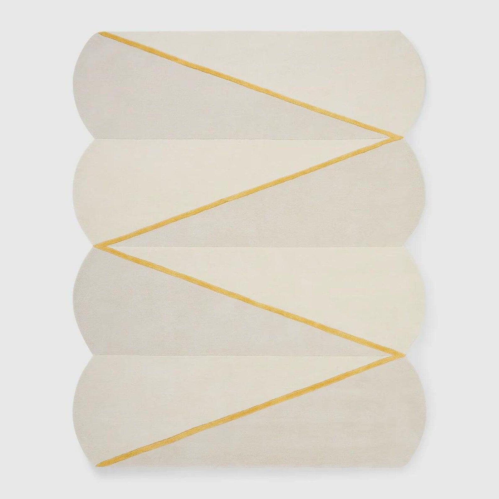 Hand tufted Rayform hand tufted rug shown in a top-angle view highlighting its curved form and precise golden line detailing on an ivory background.