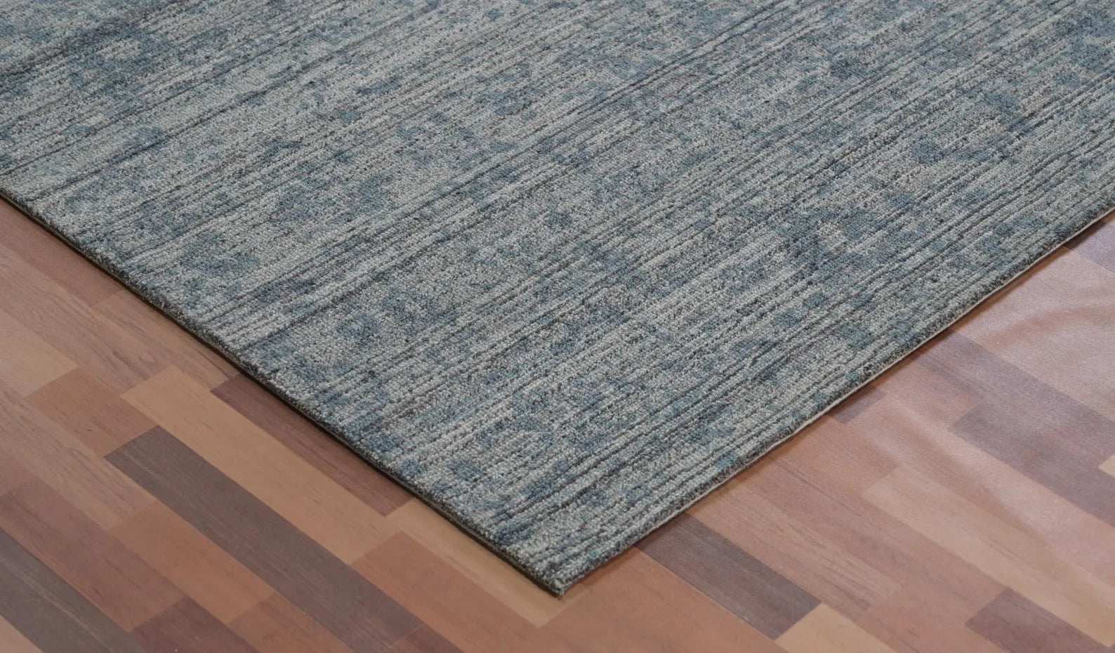 hand tufted Azure Fade Rug corner view showing smooth edges and faded artisan detailing