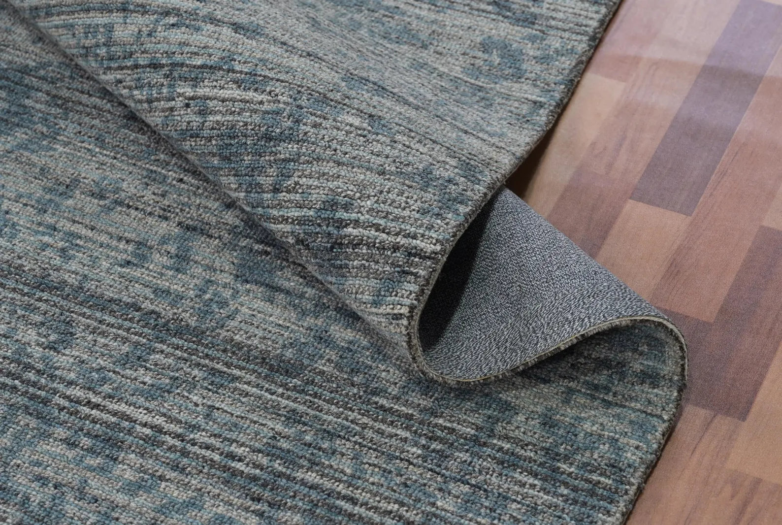 hand_tufted_azure_fade_rug_folded_corner_view