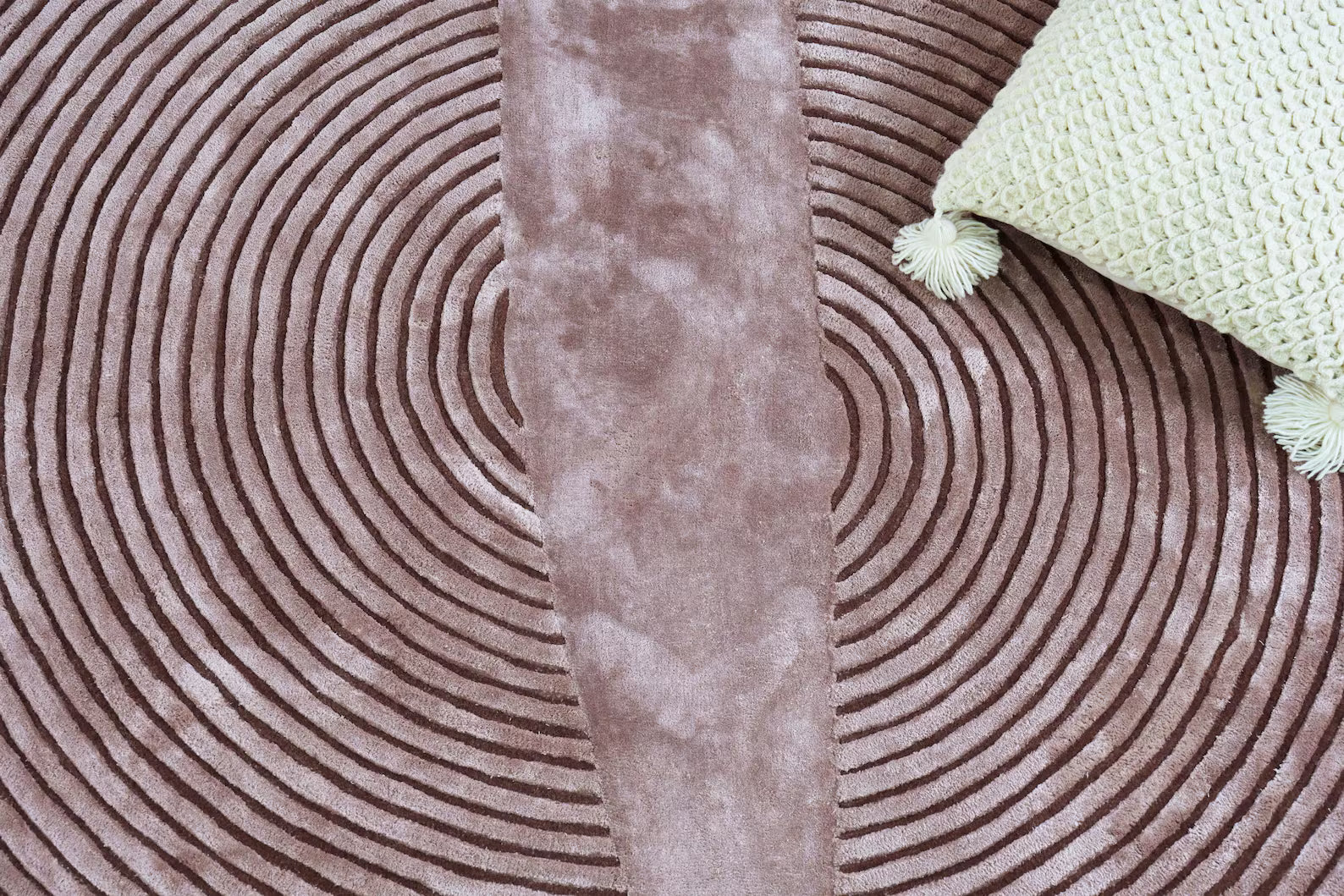 Top close-up of Circular Ribbed Rug showing detailed concentric ribbed pattern