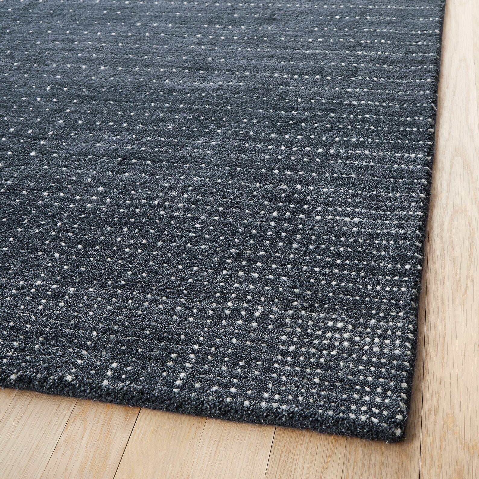 Full view of indigo dot texture wool rug showing dotted design and hand-tufted finish – Decordec