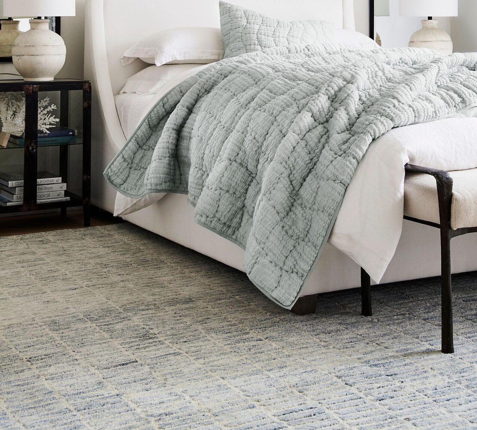 Ocean Breeze Rug styled in a bedroom interior, adding softness and a calming blue-white texture underfoot