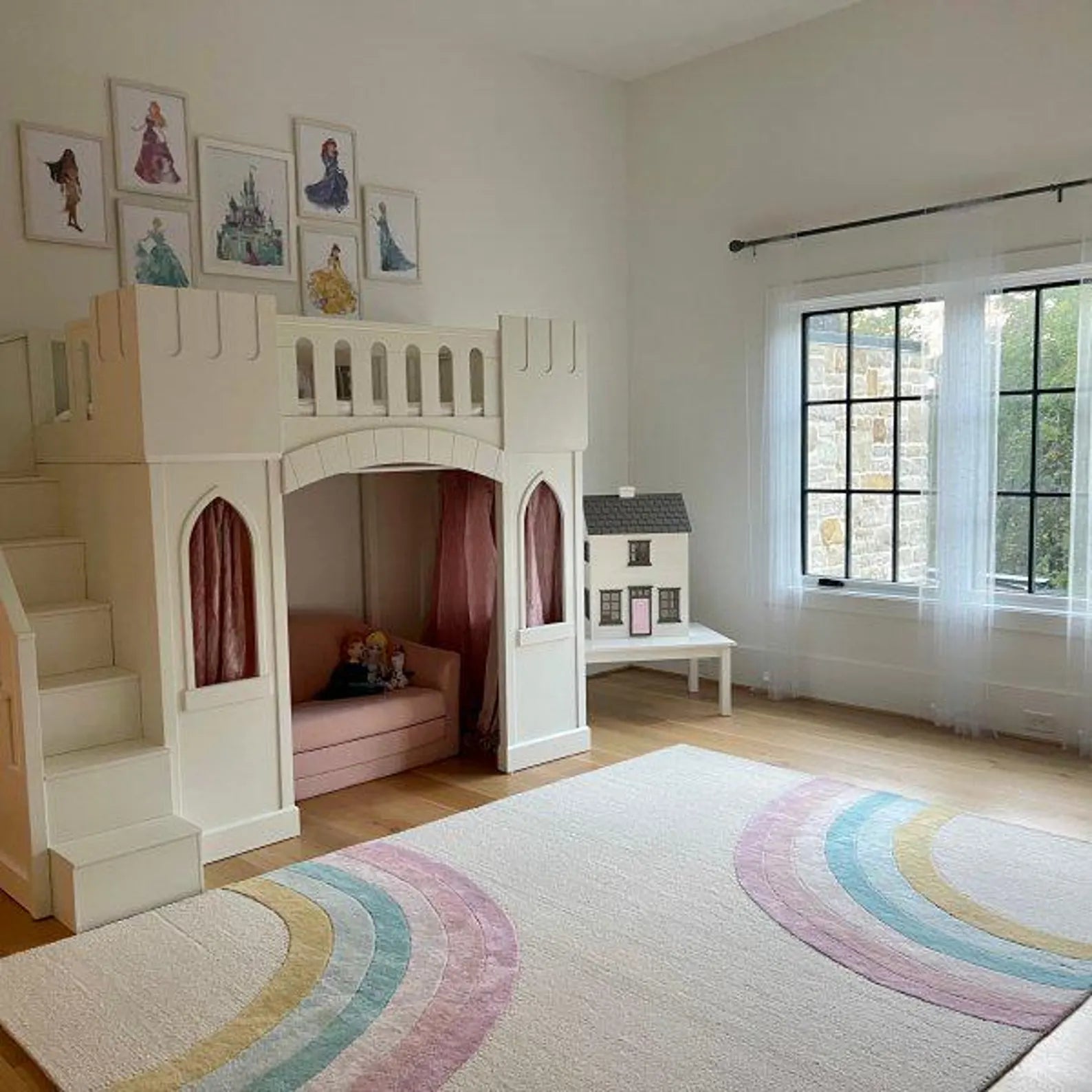 Rainbow Boho Rug styled in a bright kids room with soft pastel rainbow design