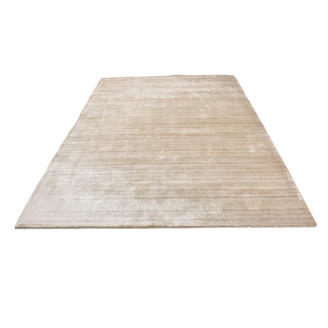 sand dune handloom textured rug flat angle view on white background