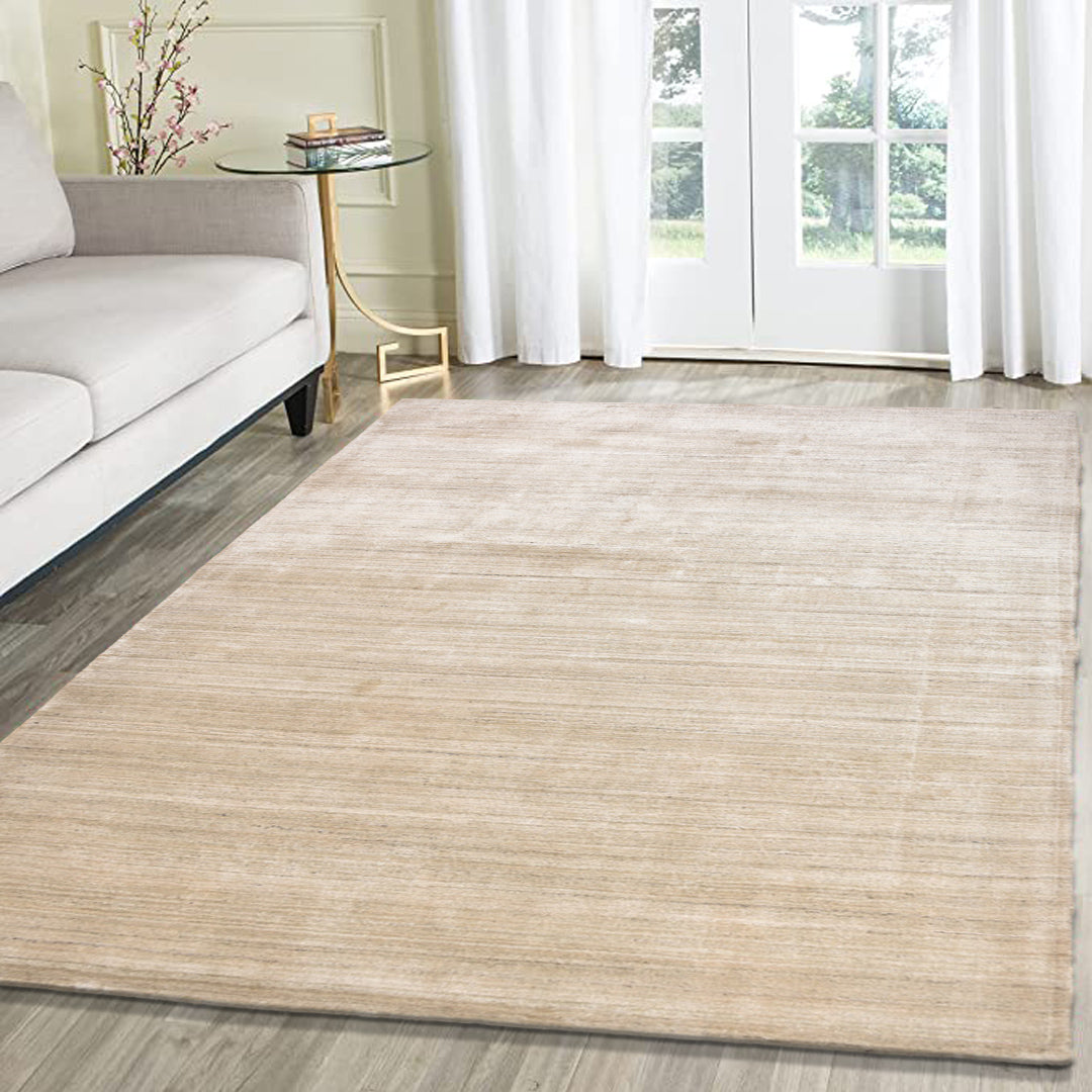 sand dune handloom textured rug placed in a living room