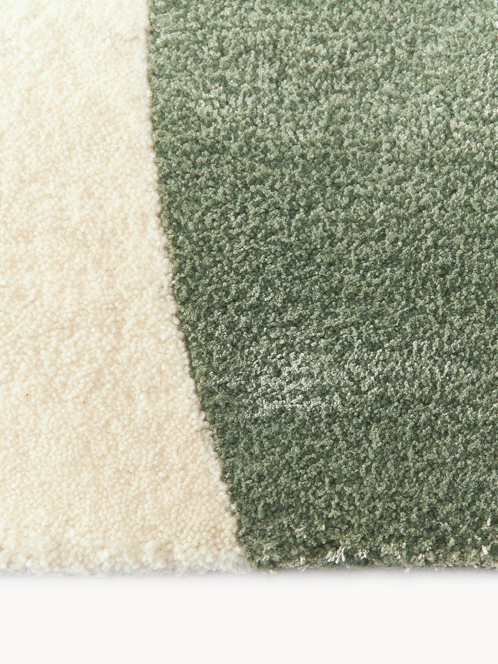 Seren Rug corner view showing plush texture and seamless curve detailing