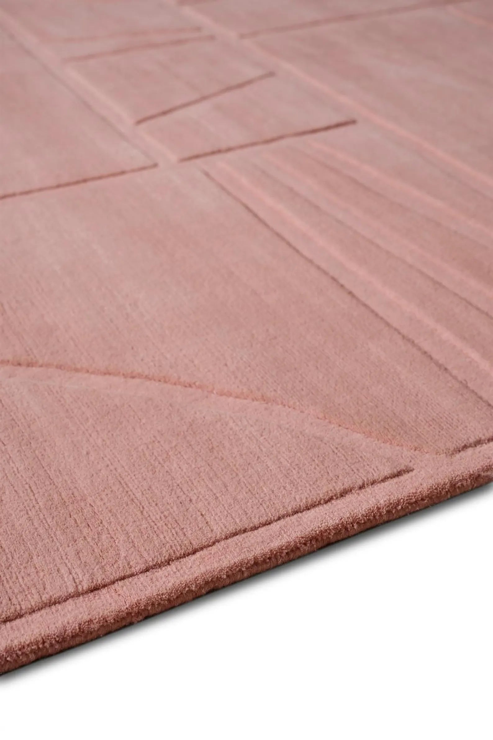 Silent Script Rug blush variant displayed in soft pink tone with linear hand tufted texture