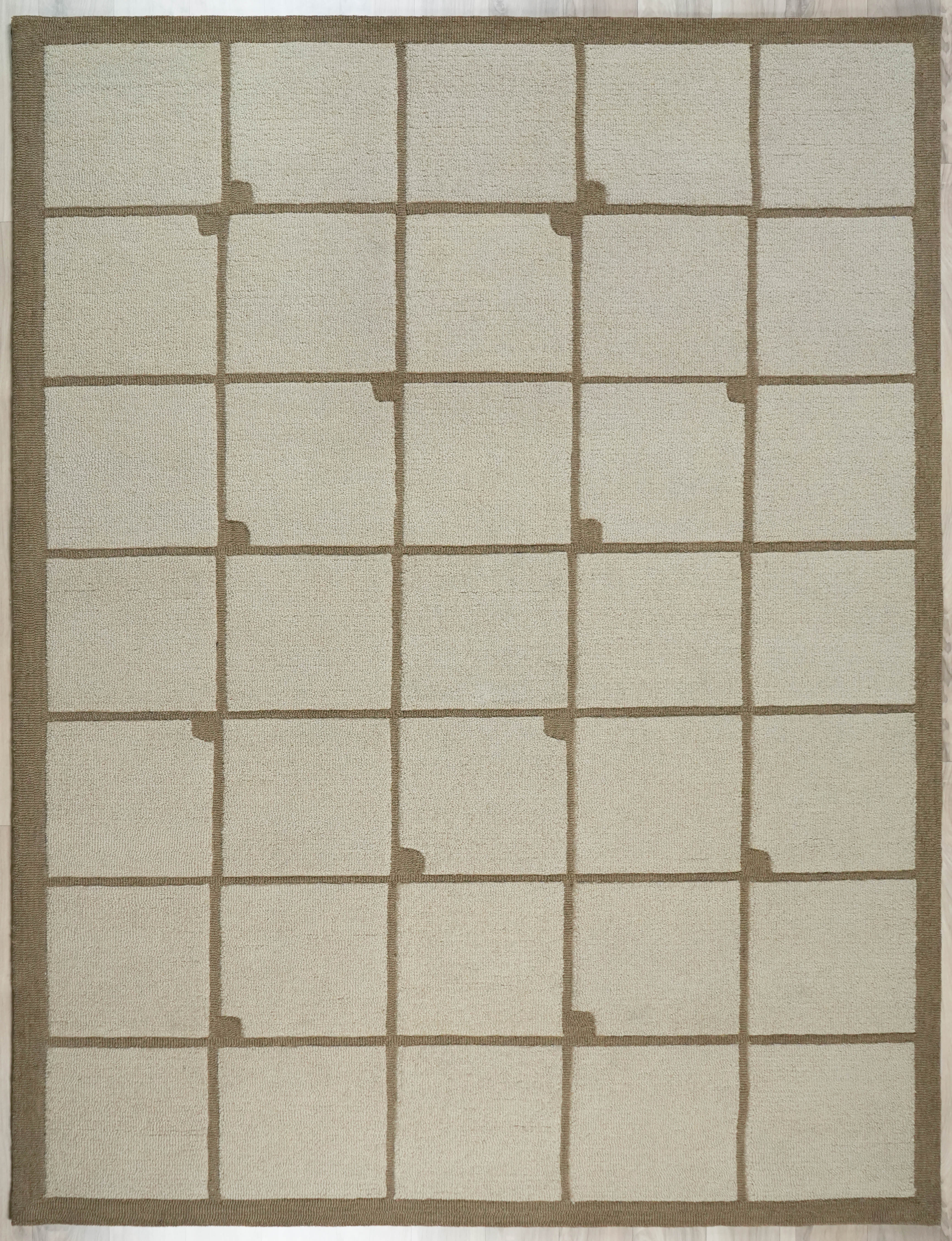 Square Field Wool Rug made from 100 % New Zealand wool with hand tufted construction shown in full view featuring a repeating square grid across a calm neutral field